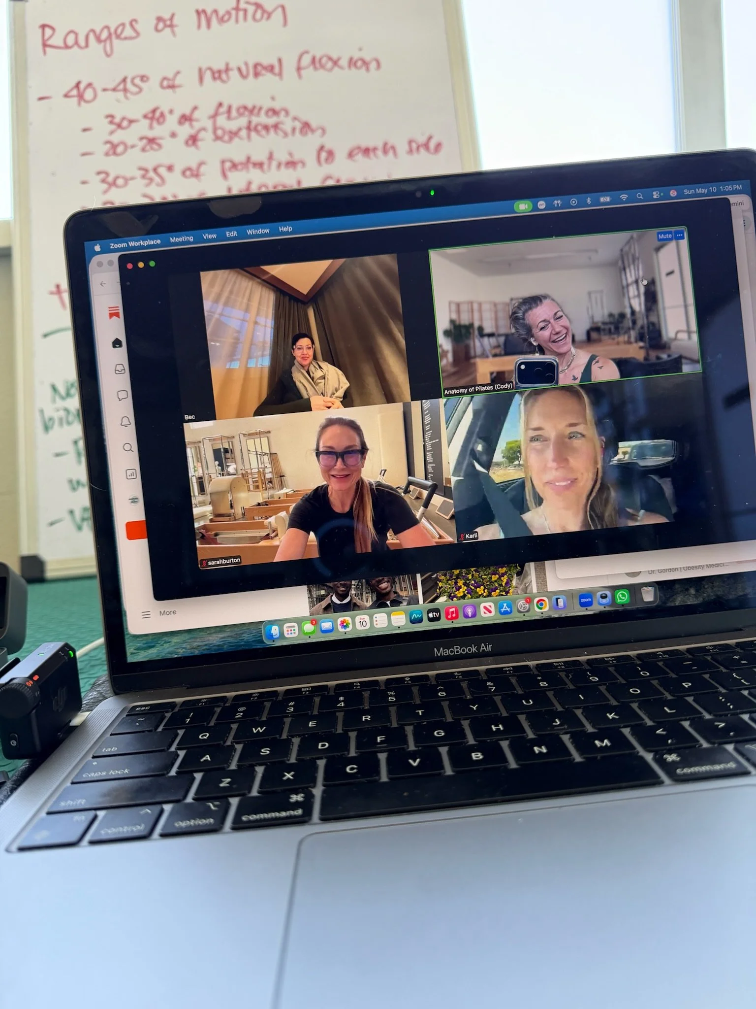 Laptop screen showing Pilates instructors on a live virtual Zoom class — AOP Movement Lab weekly online Pilates education for instructors