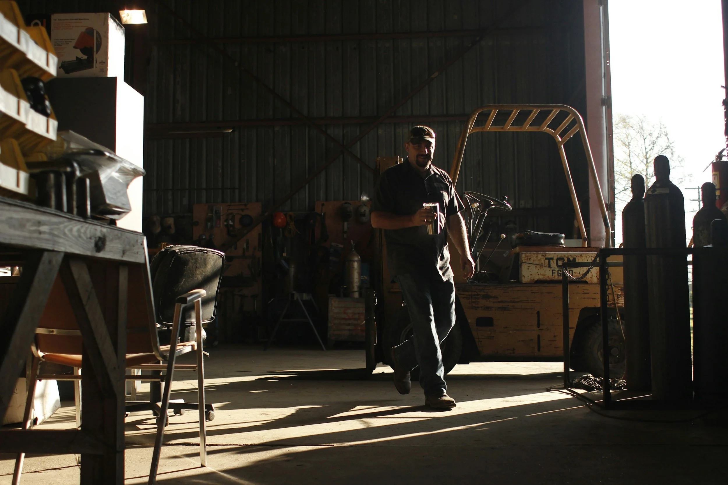Oranssi technician working on a roof project