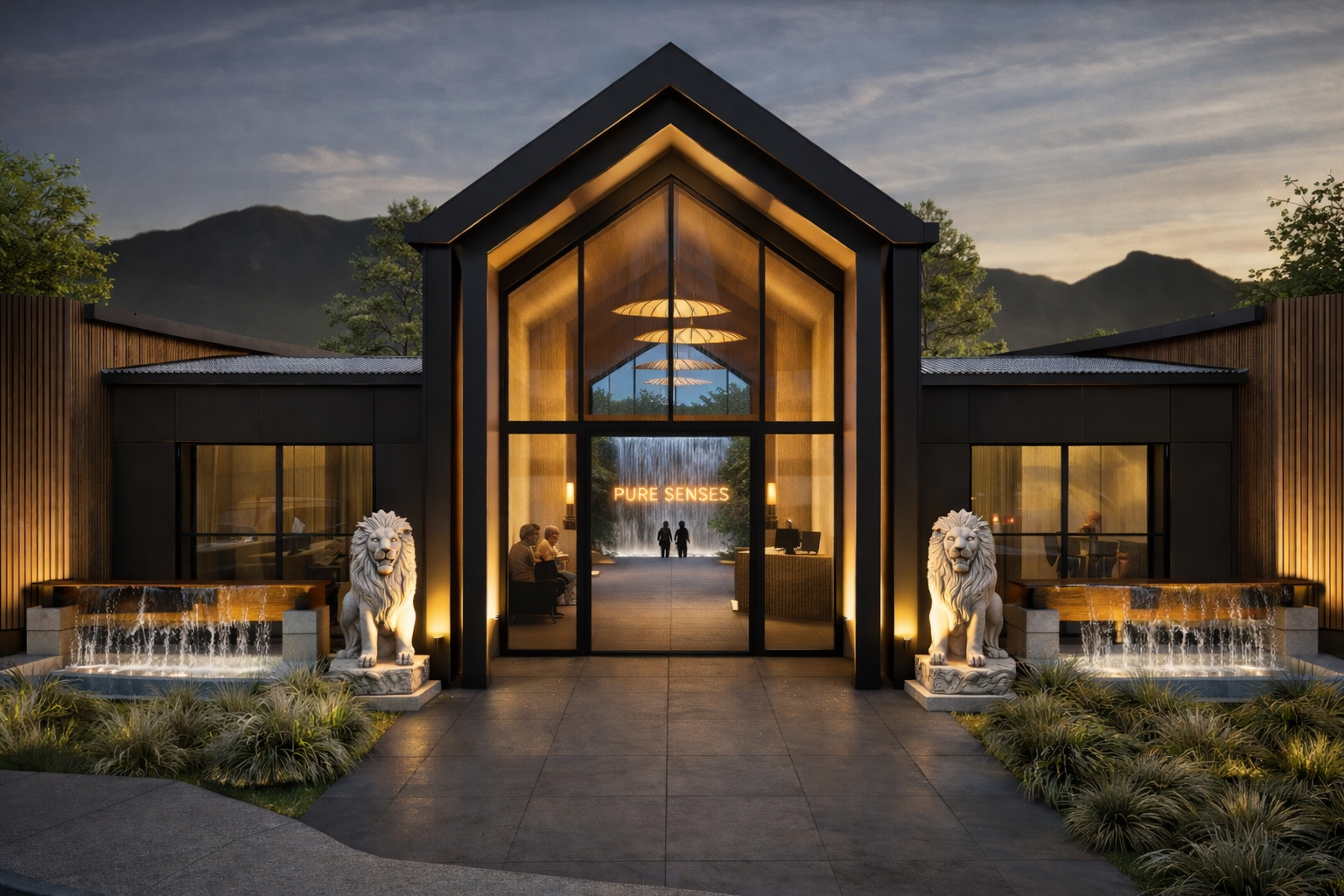 Modern building entrance with large glass facade, illuminated with warm lighting, with two lion statues and water features on either side, set against a mountainous landscape at dusk.
