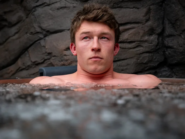 Guest focusing on his breath in the ice bath