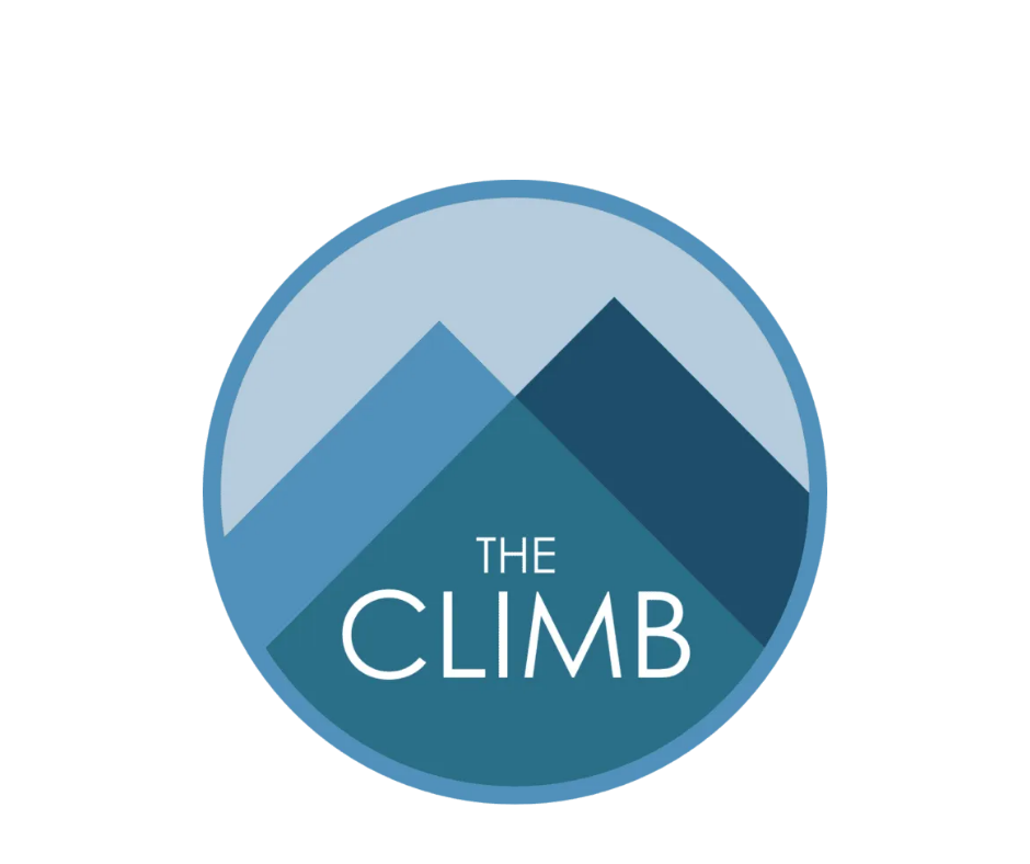 A circular logo with a mountain range and the text 'THE CLIMB' inside it.