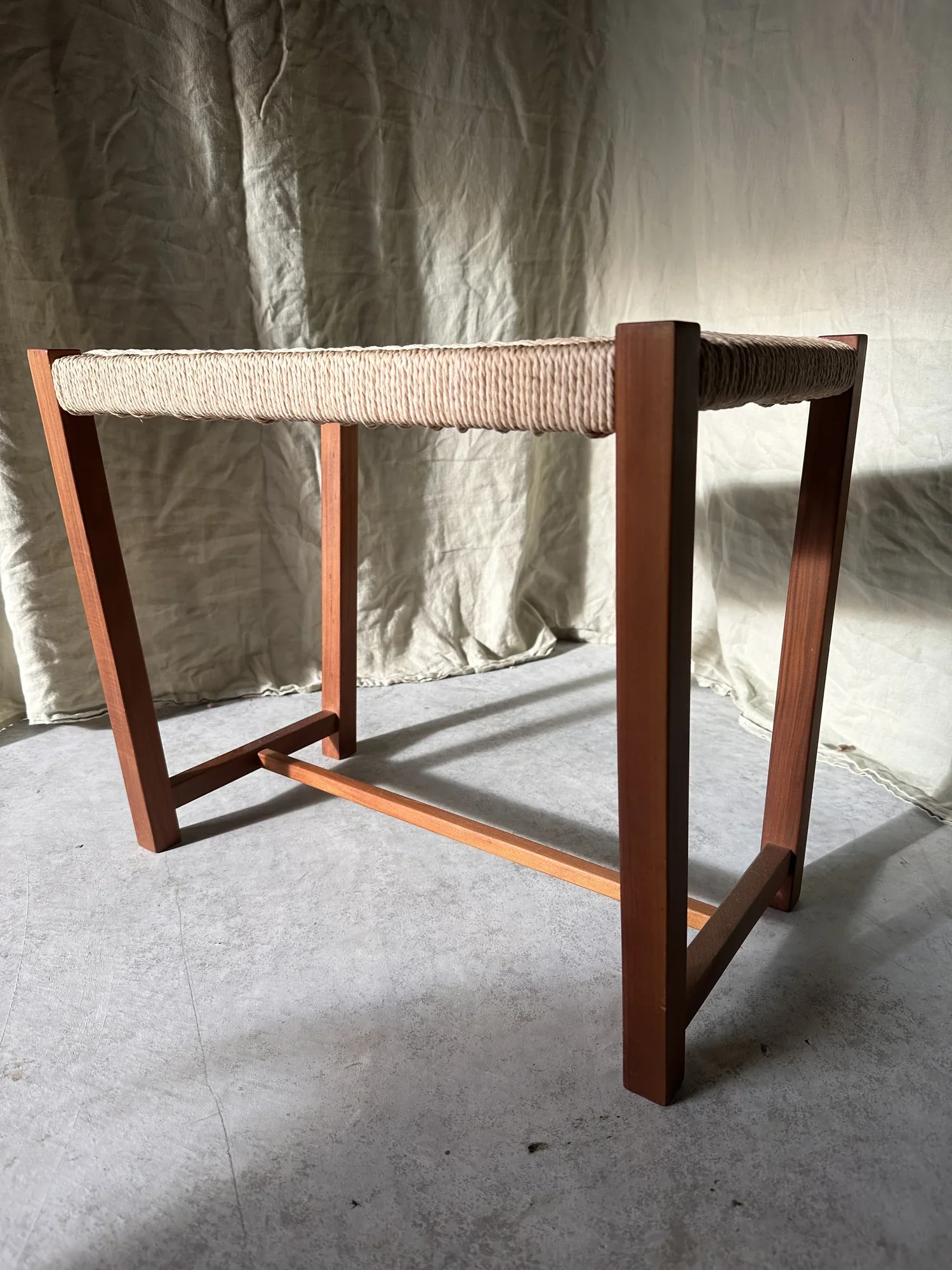 Swamp Kauri Stool with Danish furniture weaving using traditional paper cord / Kūaotunu, 2022.