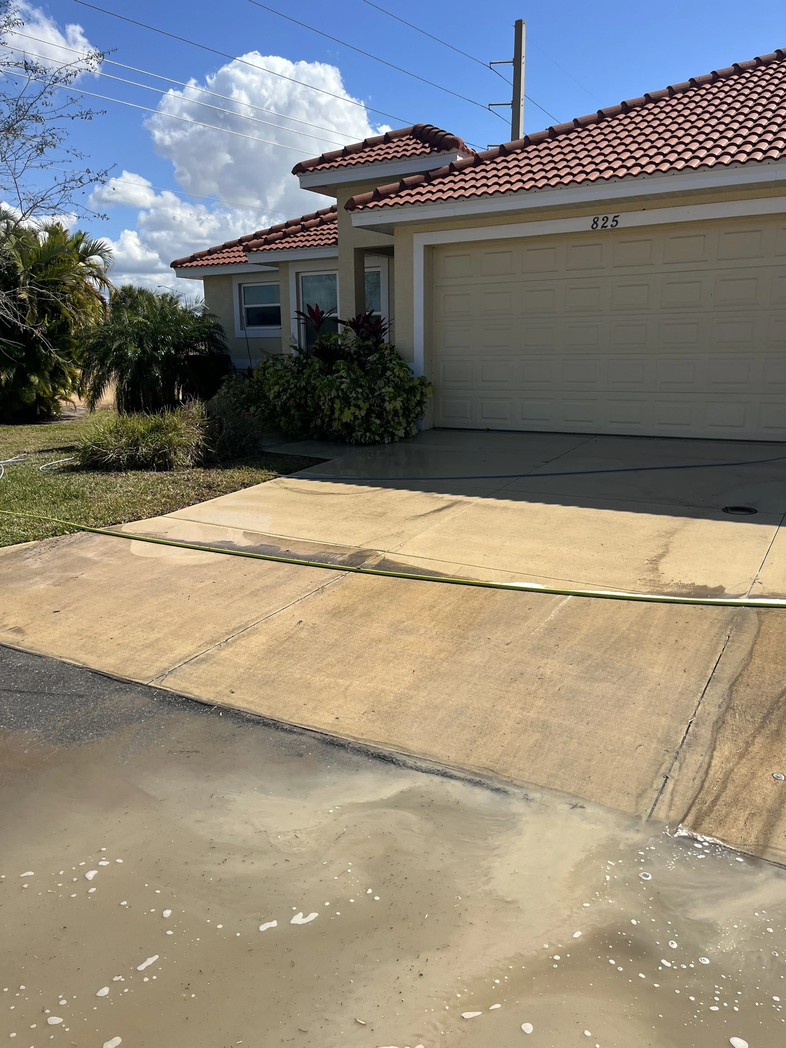 PRESSURE WASHING DRIVEWAY