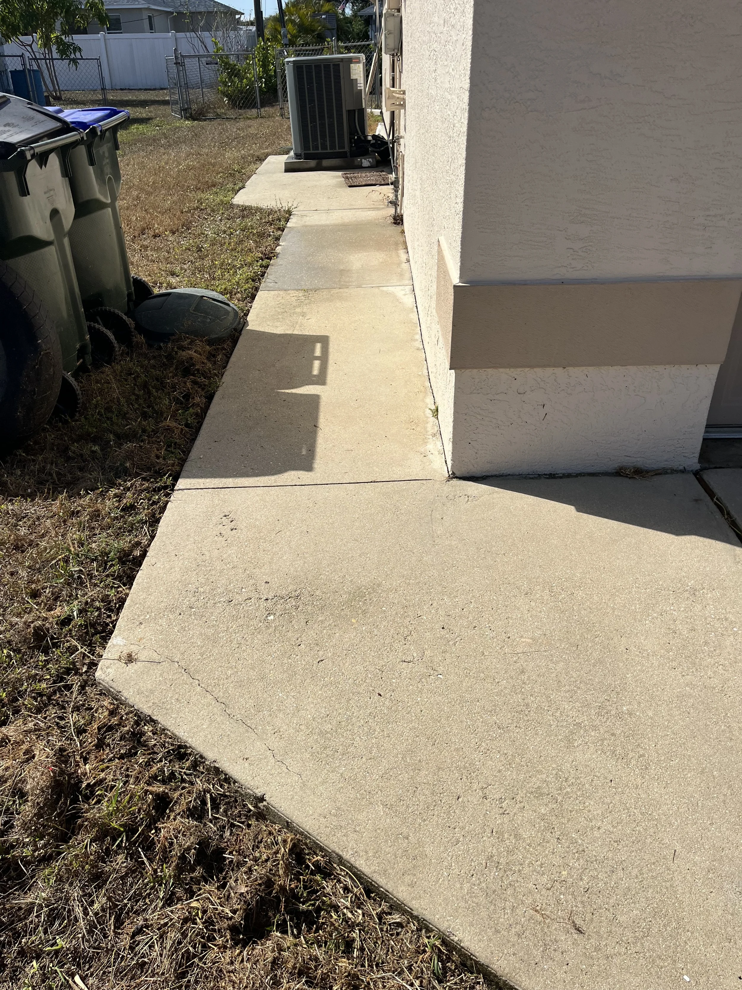 Side of House cleaned with pressure washing