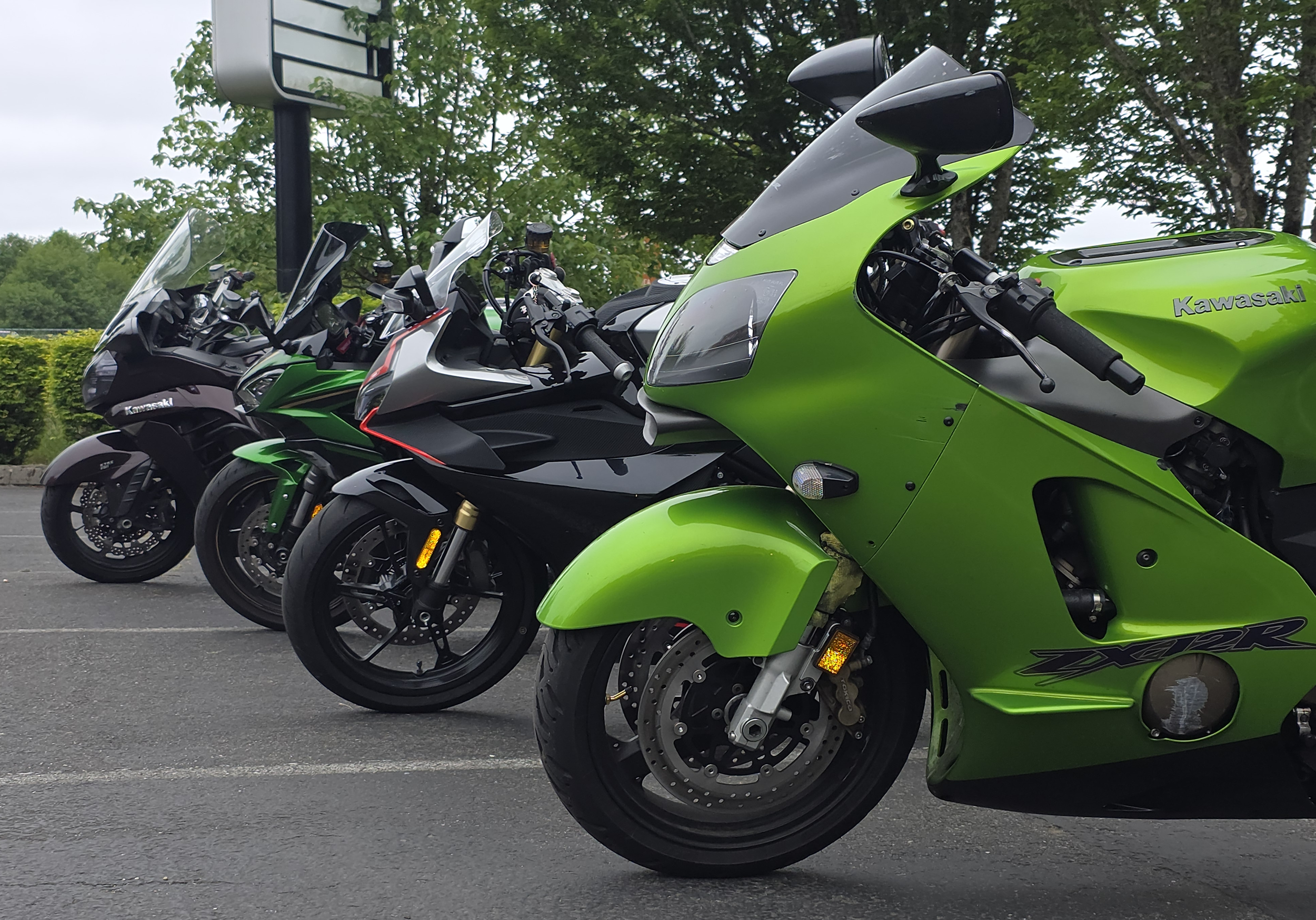 4 motorcycles lined up after having upgrades installed at DFD Cycles in Kitsap County Washinton.