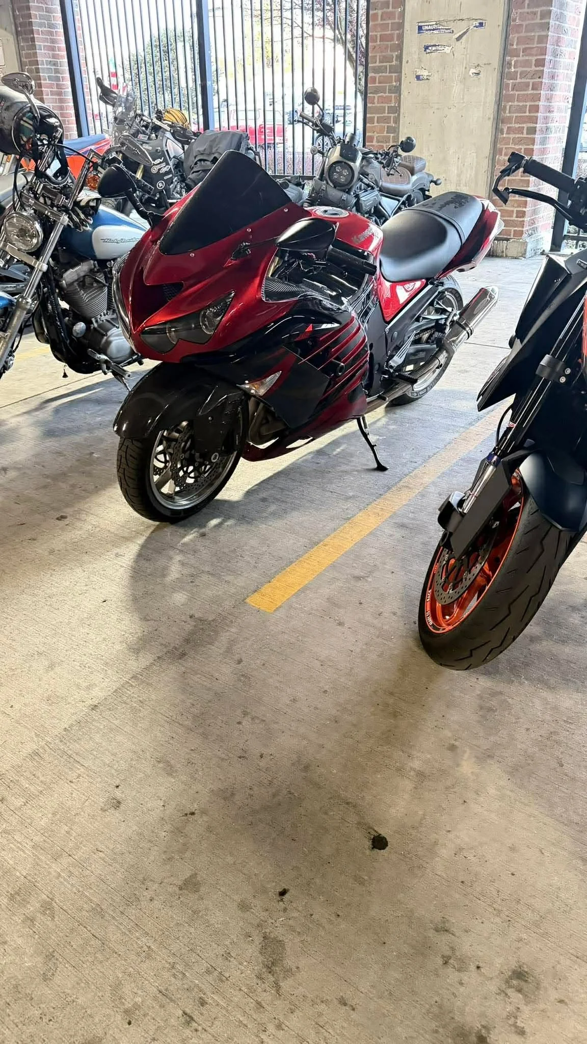 a set of motorcycle front forks after repairing at DFD CYCLES preparing for a meet-up and group ride from Repair shop in Kitsap County Washinton.