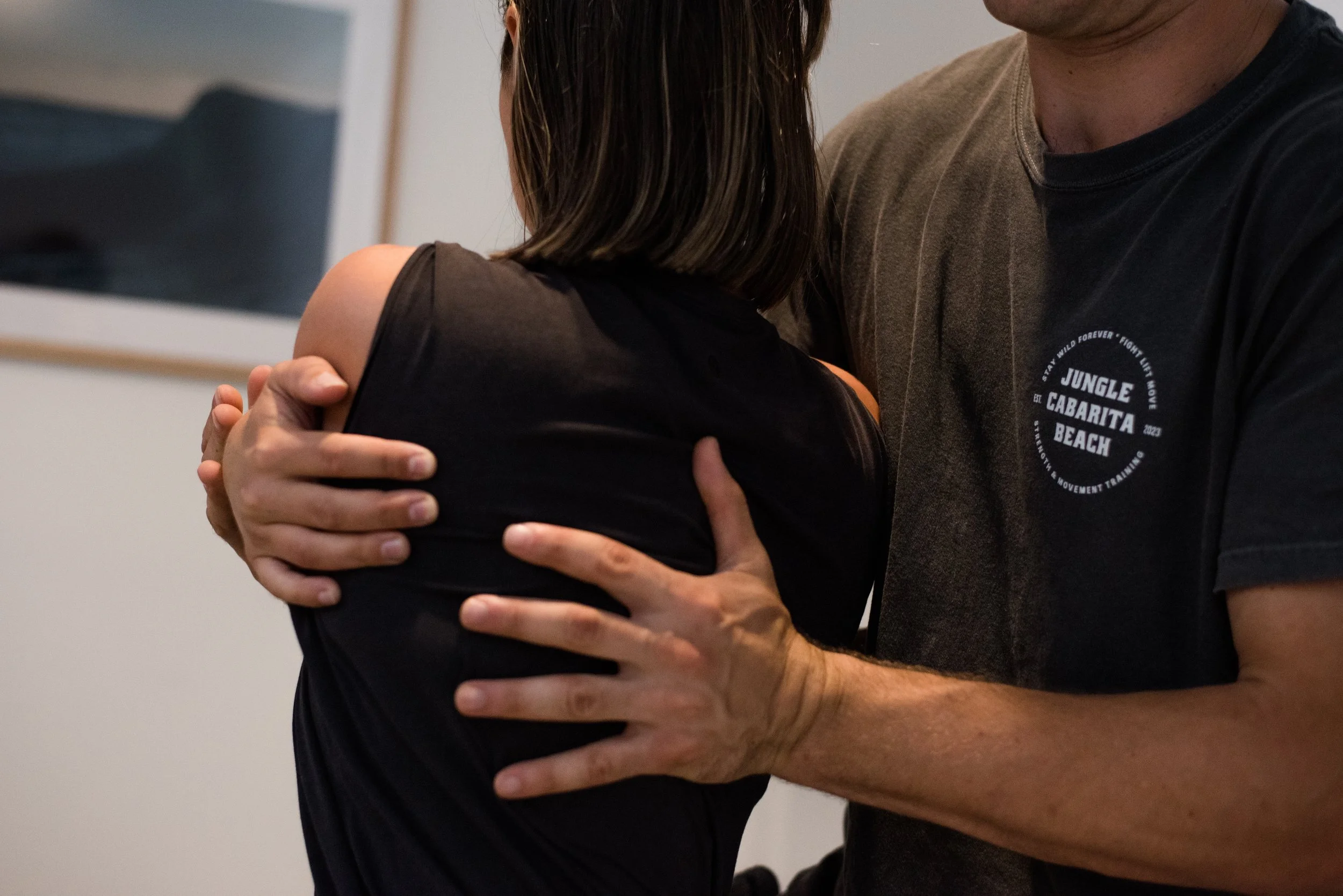 A person receiving a twisting motion through the spine from Osteopathic healthcare provider