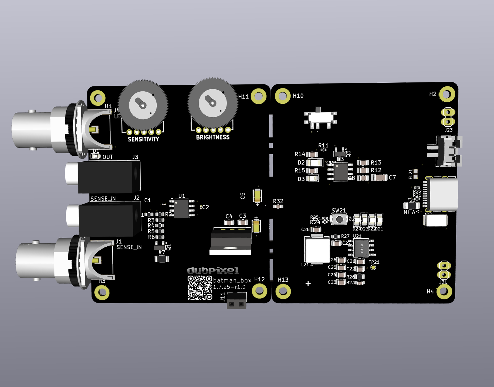 Close-up of a black printed circuit board with electronic components, connectors, and two large gray gears labeled 'Sensitivity' and 'Brightness' on the top side.