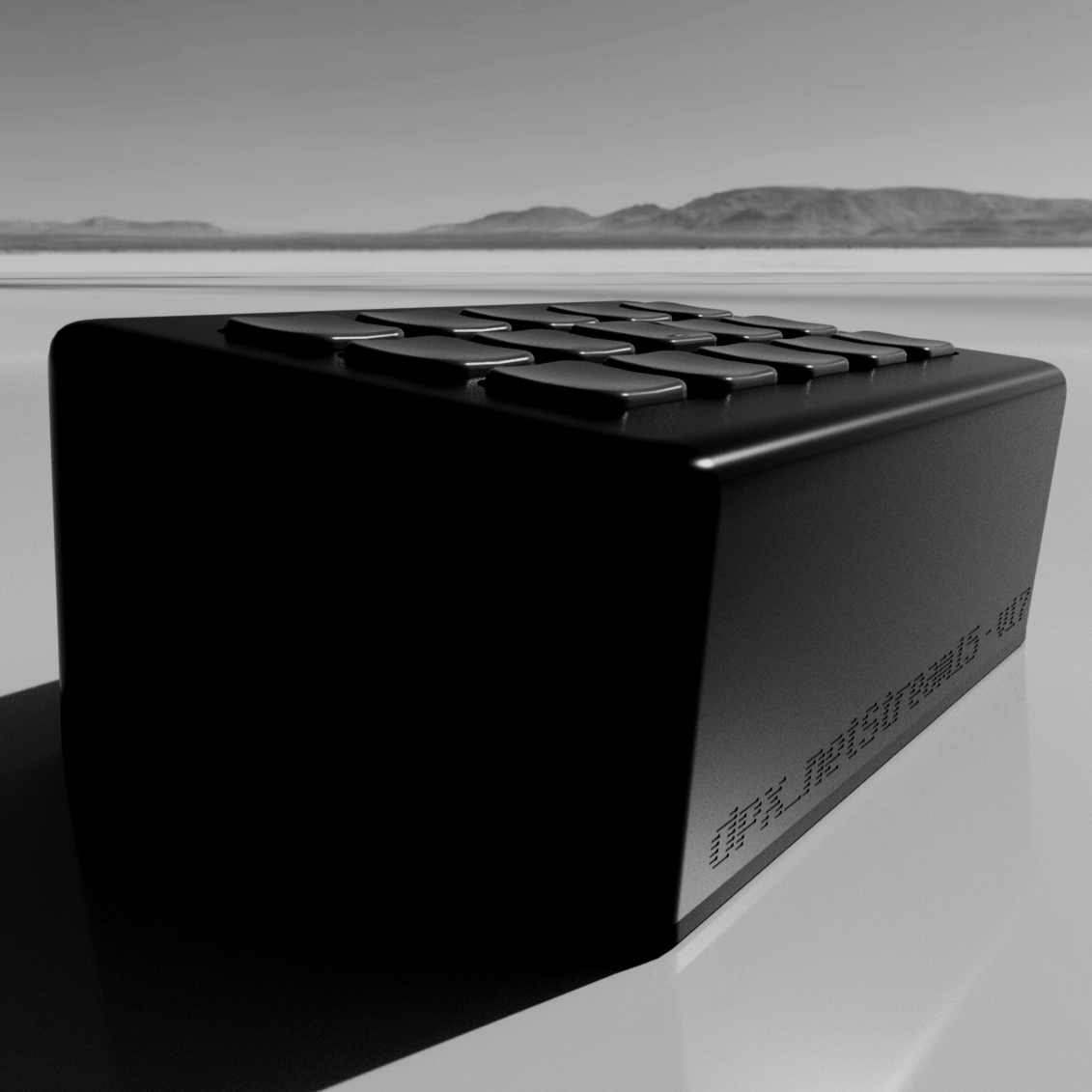Close-up of a black rectangular streamdeck electronic device with multiple buttons on top, network port -featured outdoors with mountains in the background.