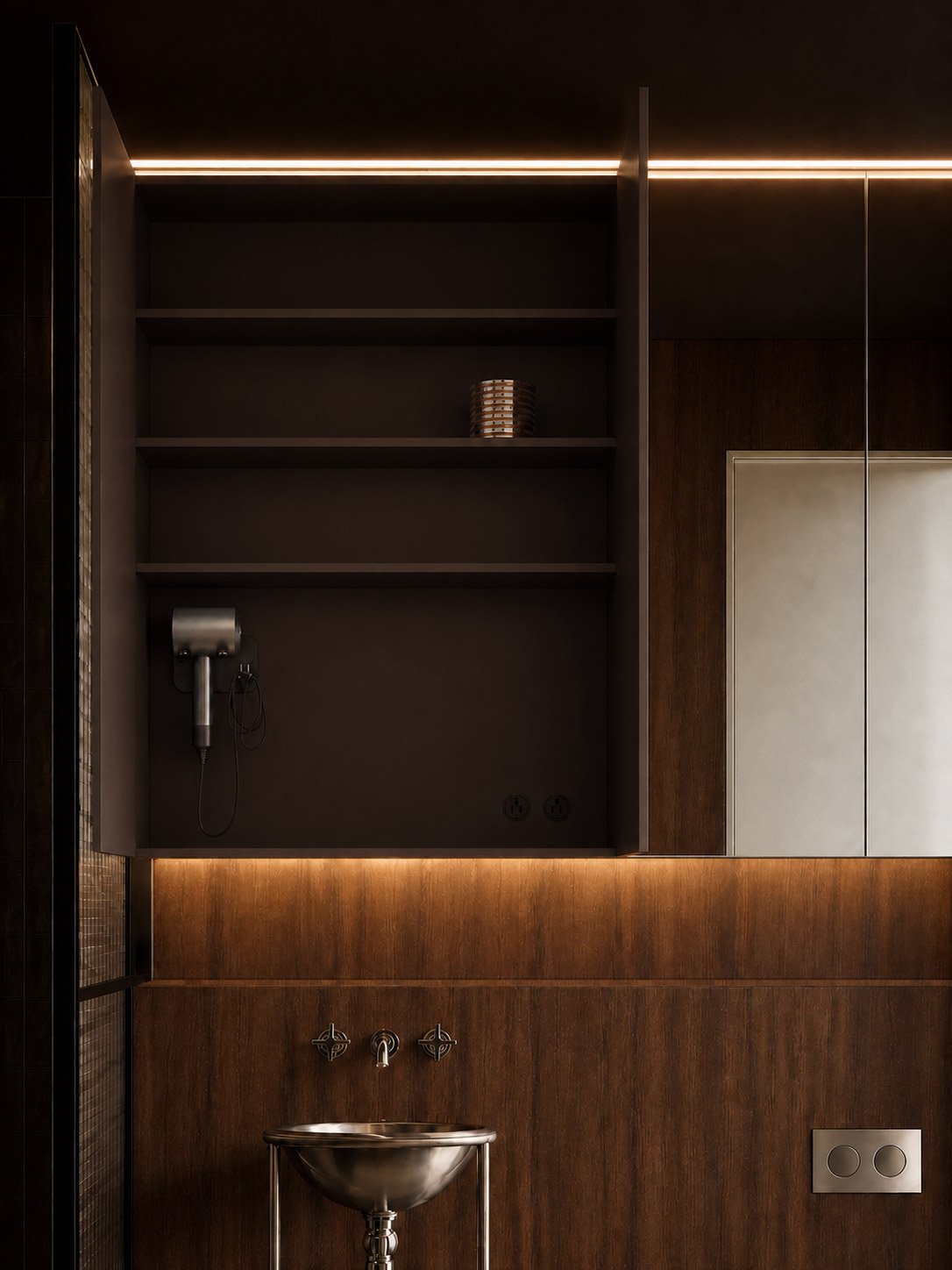 Bathroom cabinet open to an espresso interior, against dark walnut and a stainless basin
