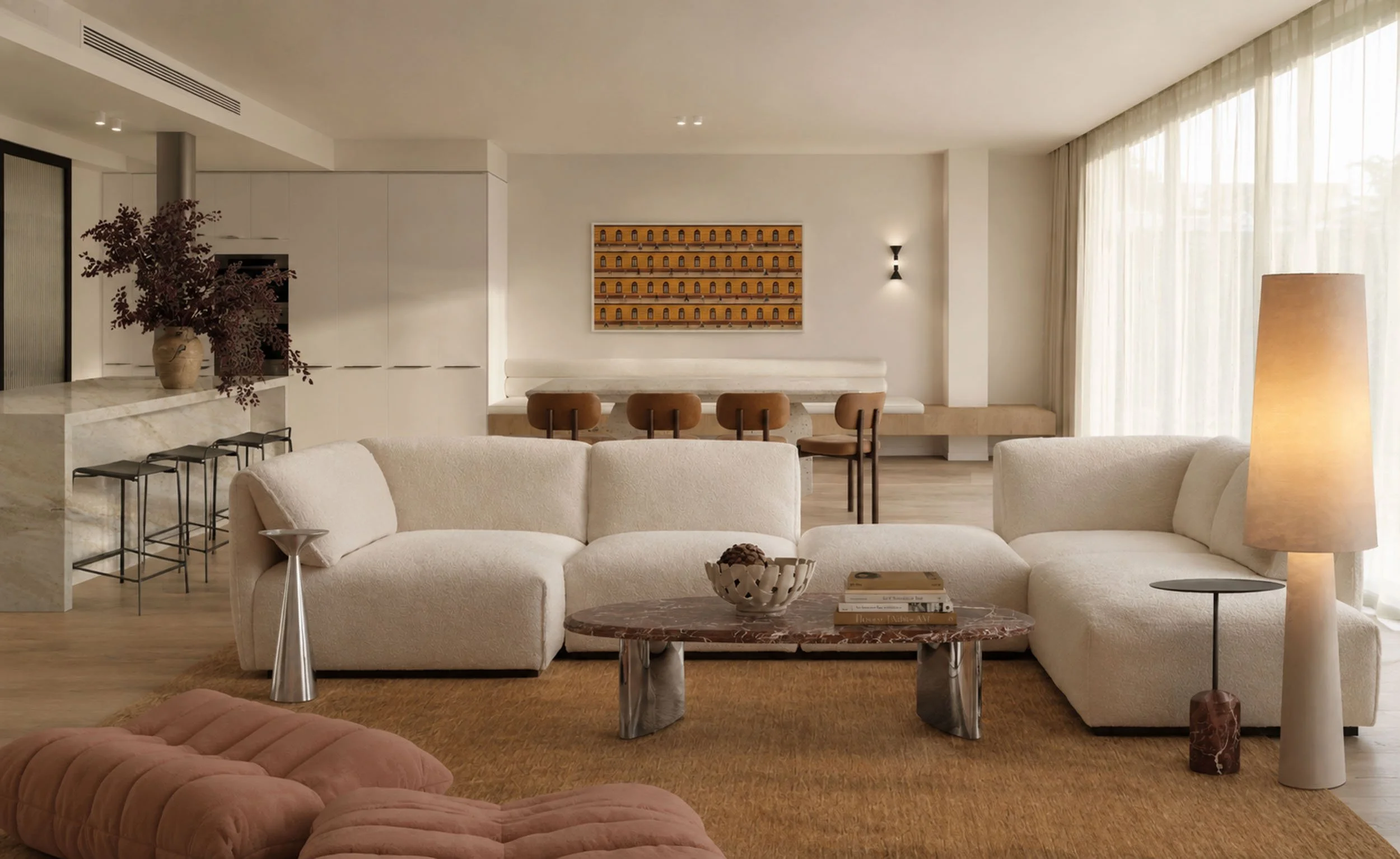 Open living and dining in cream boucle, with a Rosso Levanto coffee table on a tan rug