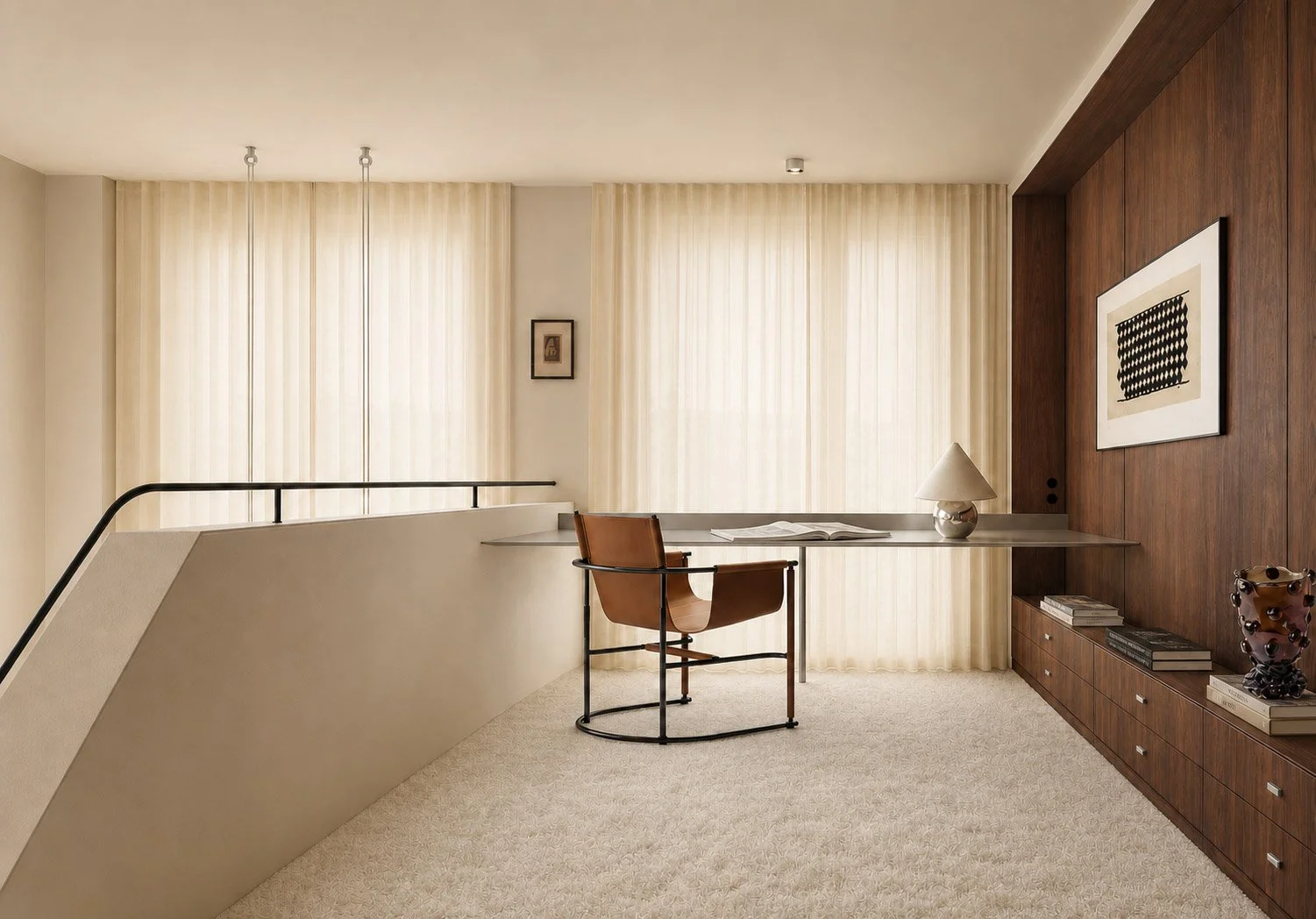 Mezzanine study with a full-length desk for two, sheer curtains and a black steel balustrade