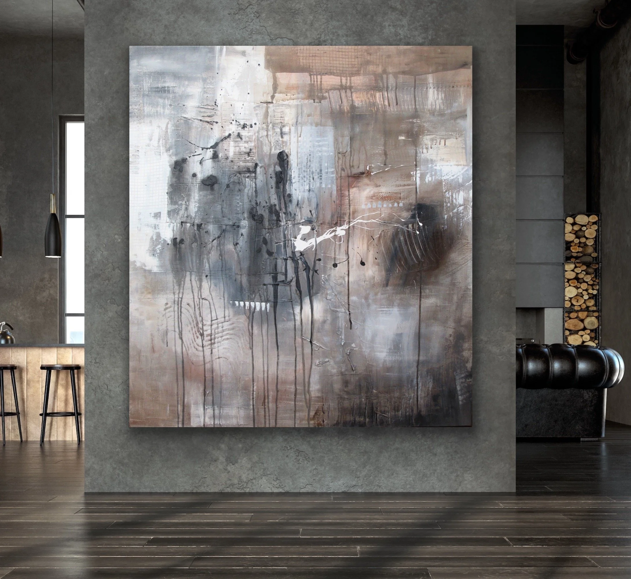 Modern abstract painting with various shades of gray, beige, white, and black, featuring drips, splatters, and textured brushstrokes, hung on a gray wall in an interior space.