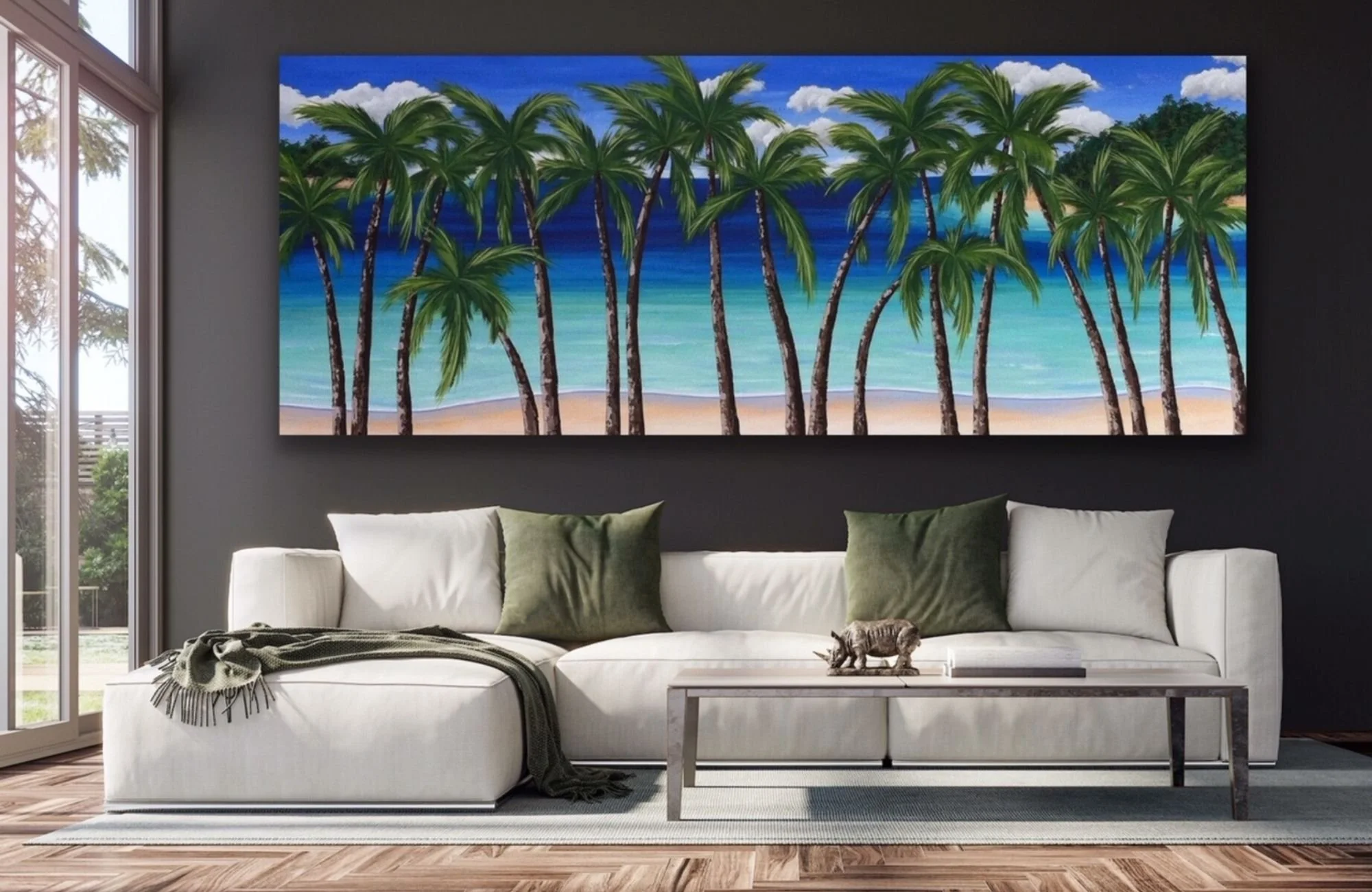 Painting of palm trees and ocean on a living room wall