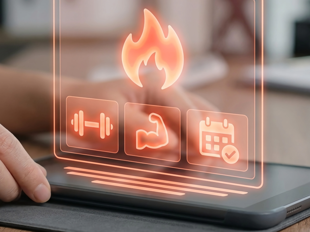 A transparent digital overlay showing icons of a fire, dumbbell, biceps, and a calendar on a person using a tablet.
