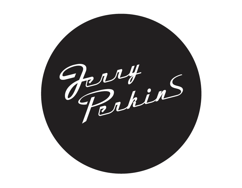 Black circular logo with white cursive text reading 'Jerry Perkins'.