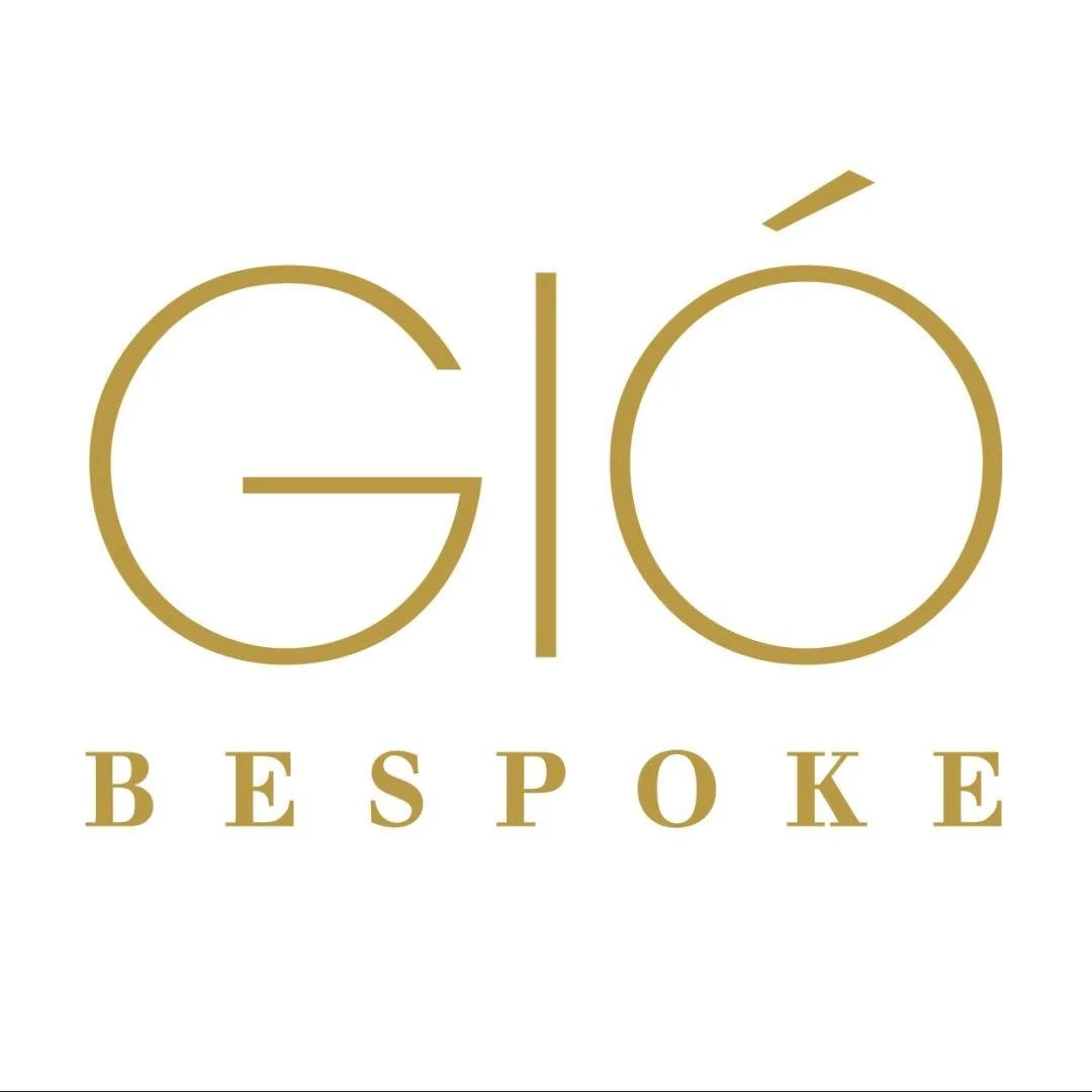 Logo with the words 'GÉ' and 'BESPOKE' in gold text, with a white background.