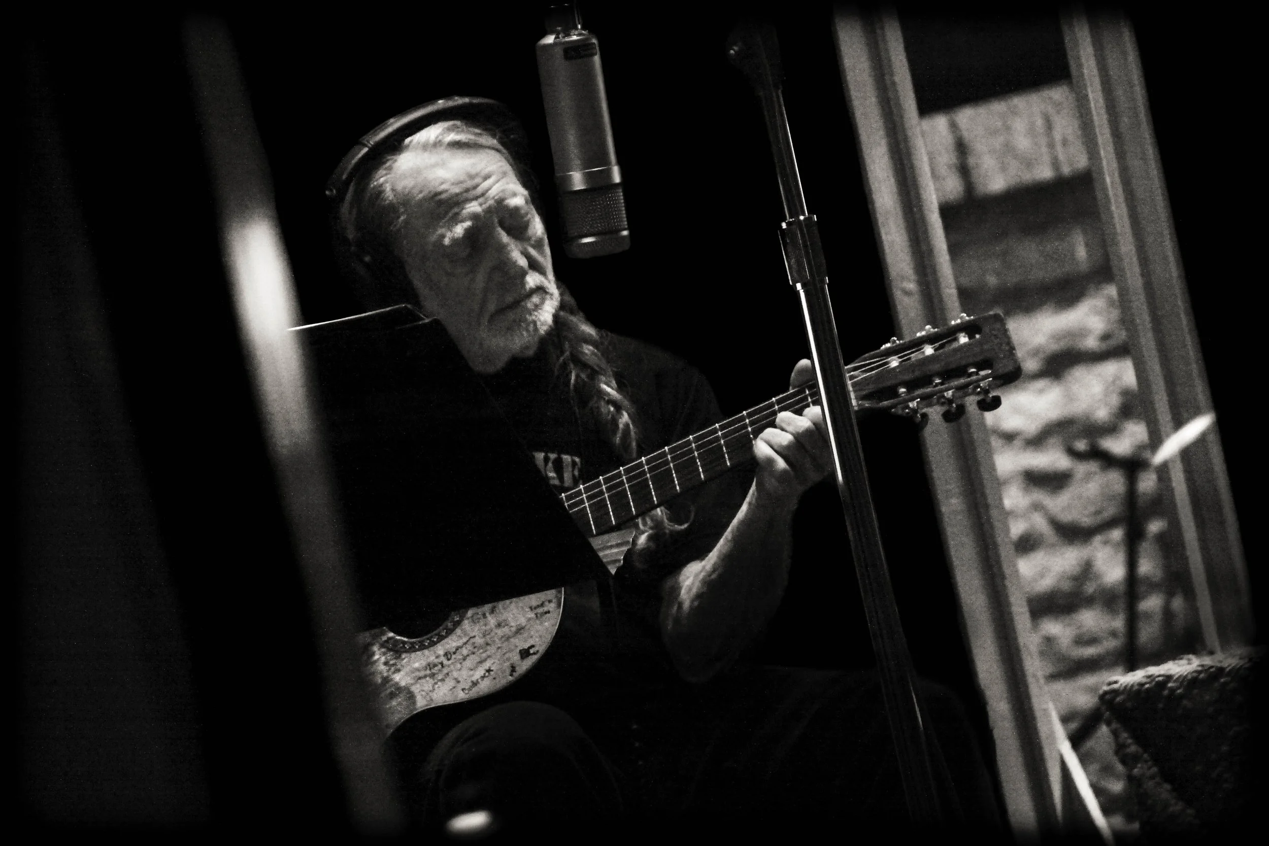 Willie Nelson in studio.
