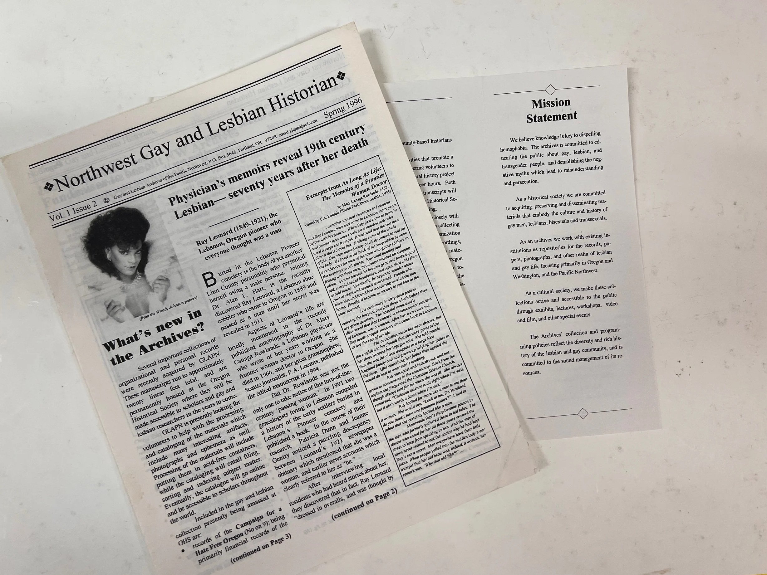 A page from a newsletter titled "Northwest Gay and Lesbian Historian," with text and a black-and-white photograph of a woman with curly hair on the left side.