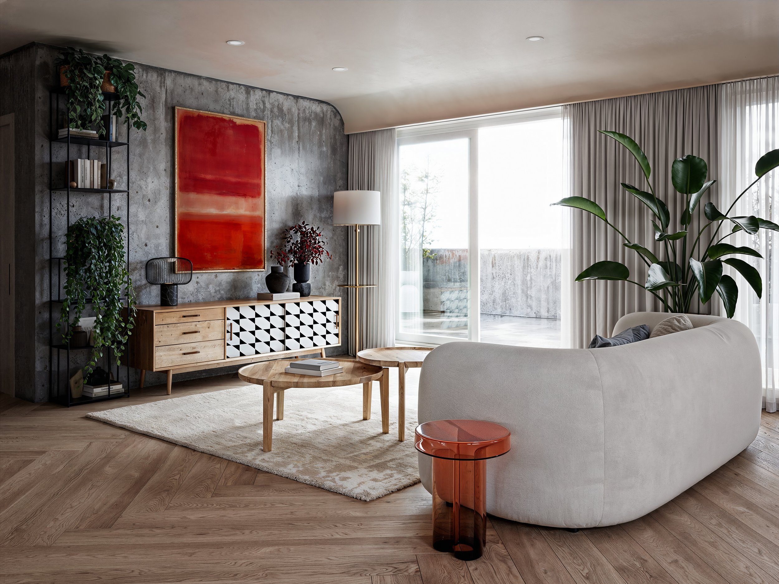 Living room with wooden floor, gray concrete wall, abstract red painting, white couch, small wooden coffee tables, large green plant by window, white curtains, floor lamp, decorative vases, bookshelf with plants.