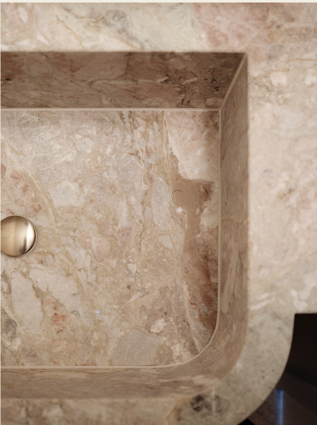 When craft matters, a custom made bathroom with a stone integrated sink, designed and crafted with precision