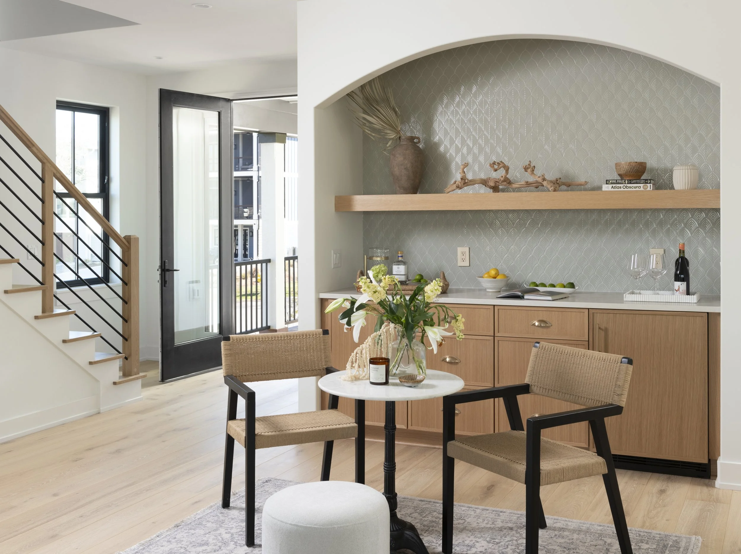 Open-concept kitchen designed for entertaining with custom millwork, oversized island, and seamless indoor-outdoor flow.