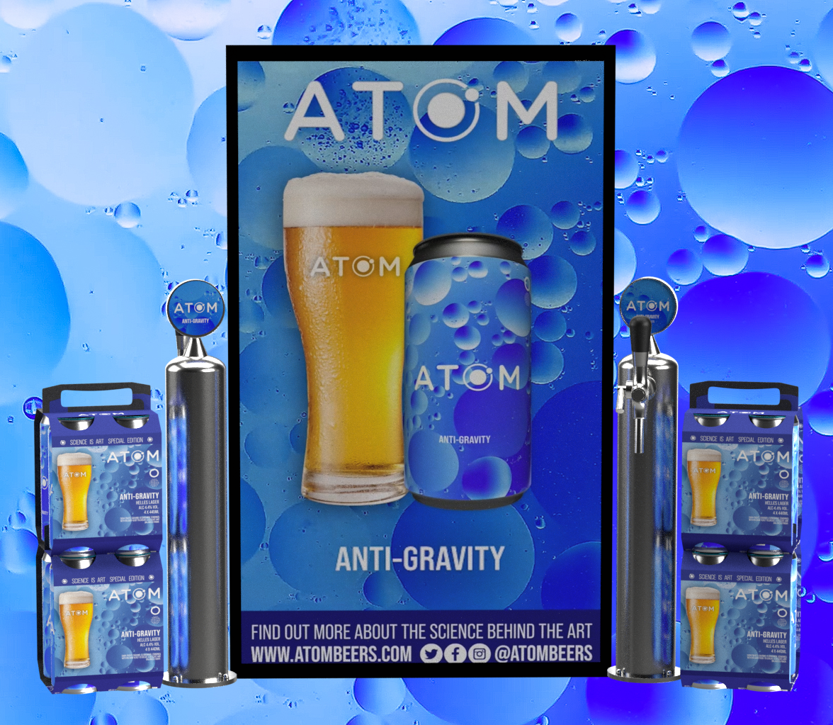 Display promoting Atom beer as an anti-gravity beer with a large poster of a beer glass and a beer can, surrounded by smaller Atom beer cans and a tap, with a blue bubbly background.