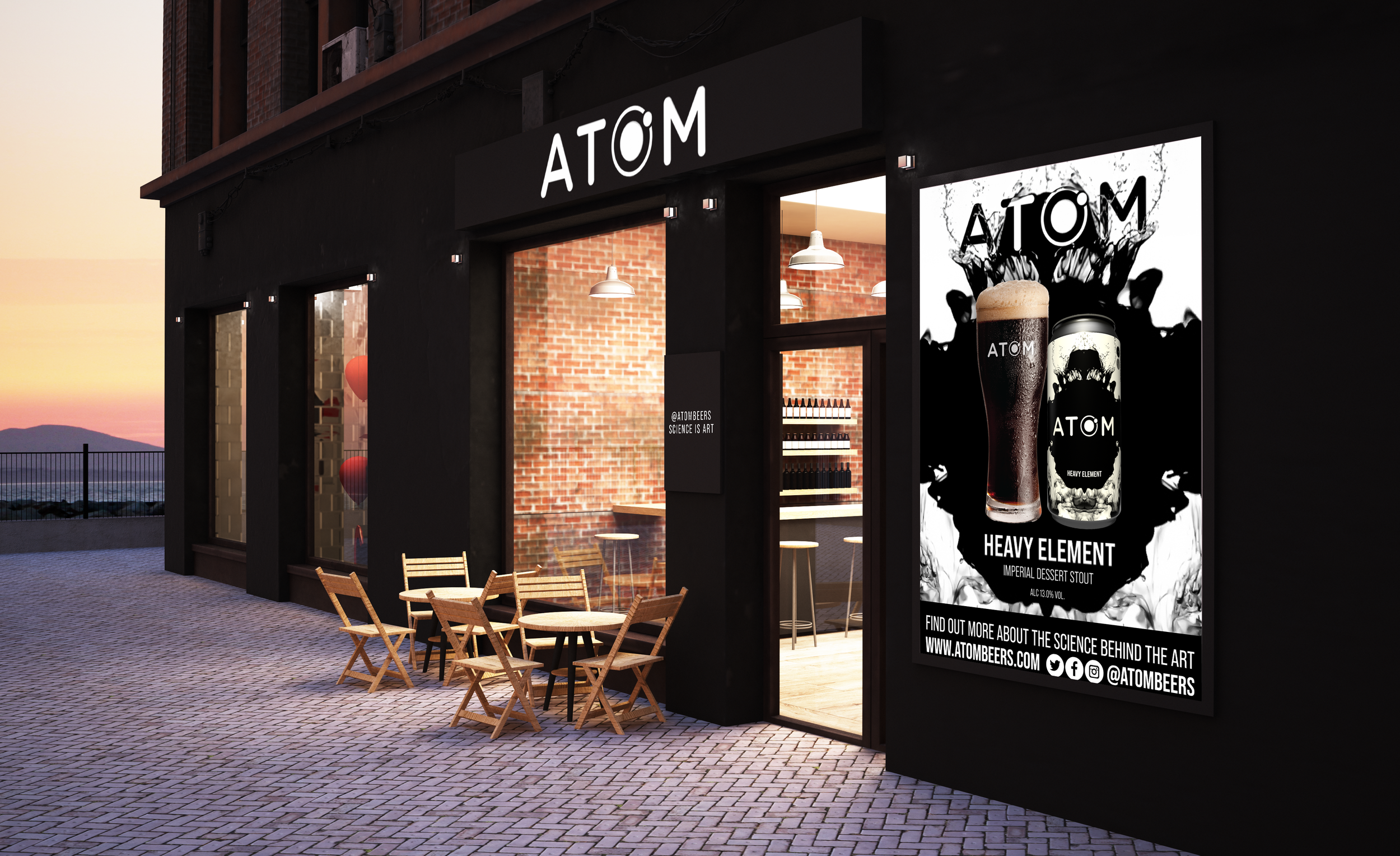 Exterior of a modern black building with large windows, outdoor seating, and a prominent poster advertising 'Heavy Element' imperial dessert stout beer by Atom Beers. The poster features a black beer glass with foam, and a black and white graphic bac
