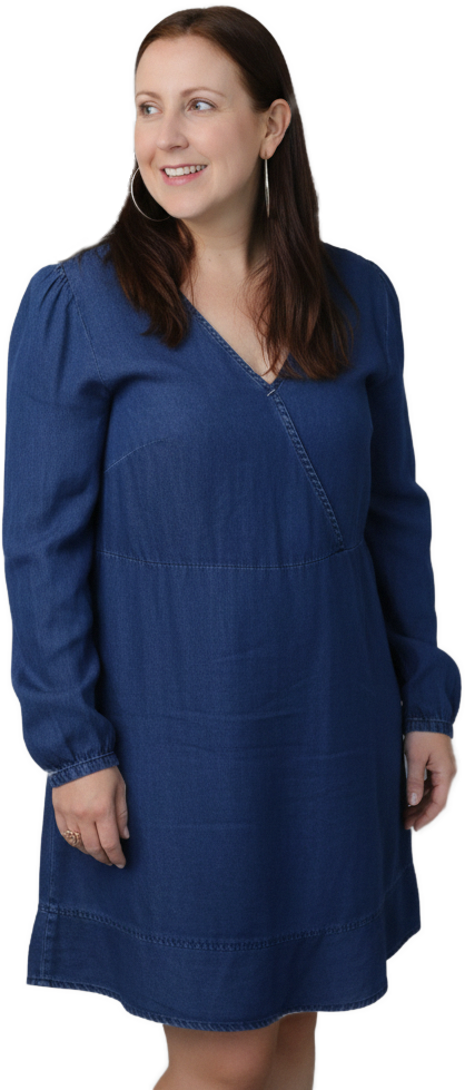 Kerry Fox standing and smiling.