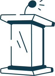 Line drawing of a person standing behind a podium giving a speech or presentation