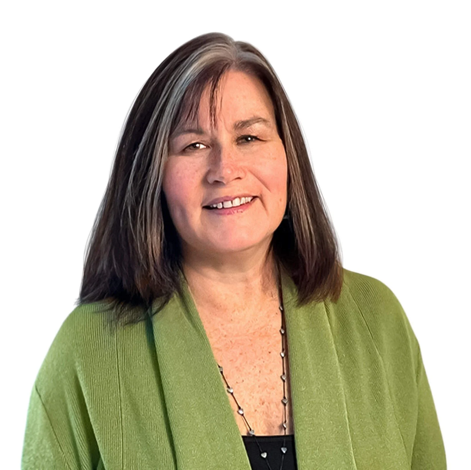 A woman with brown hair wearing a green cardigan smiling into the camera.