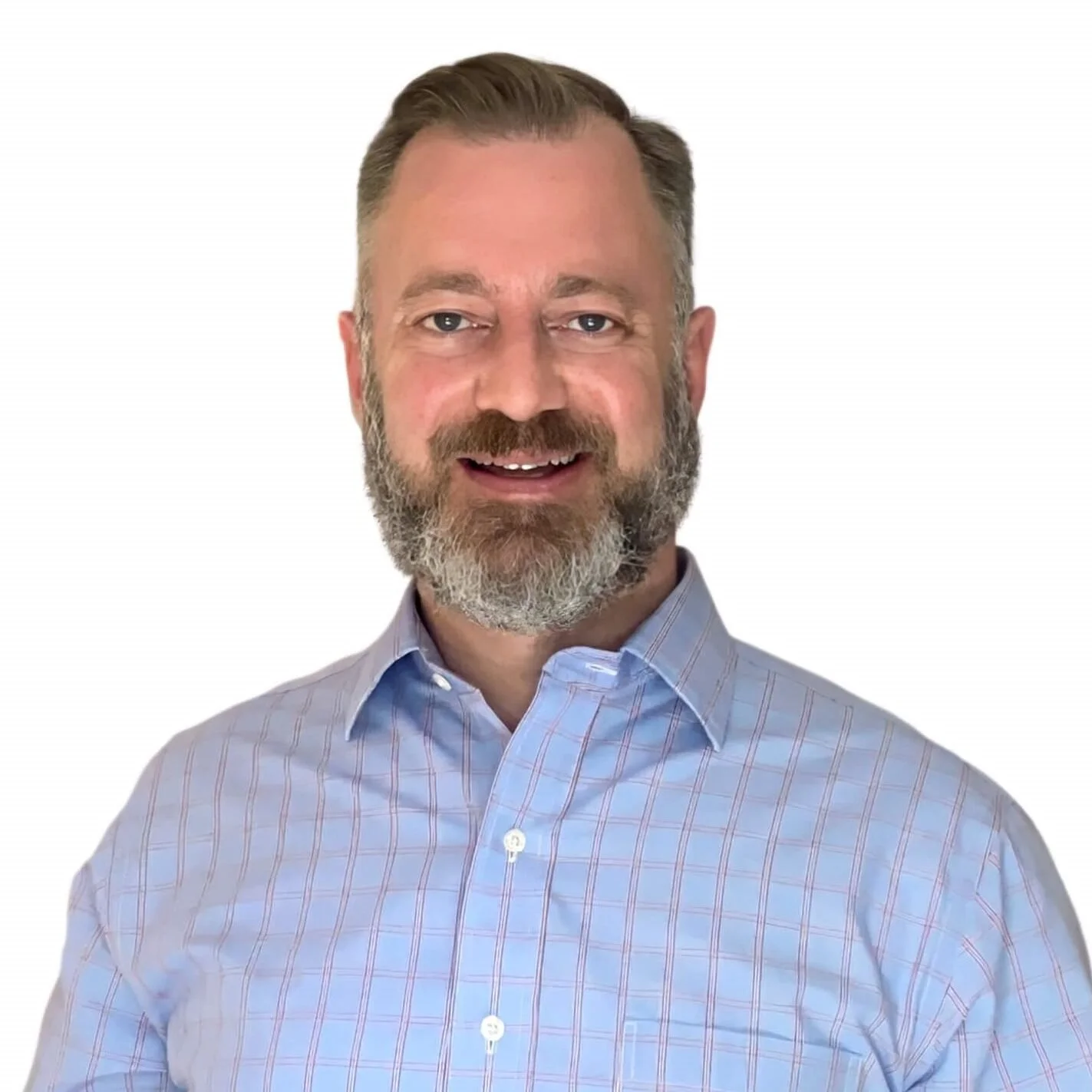 A professional headshot of a man with a beard wearing a blue shirt.