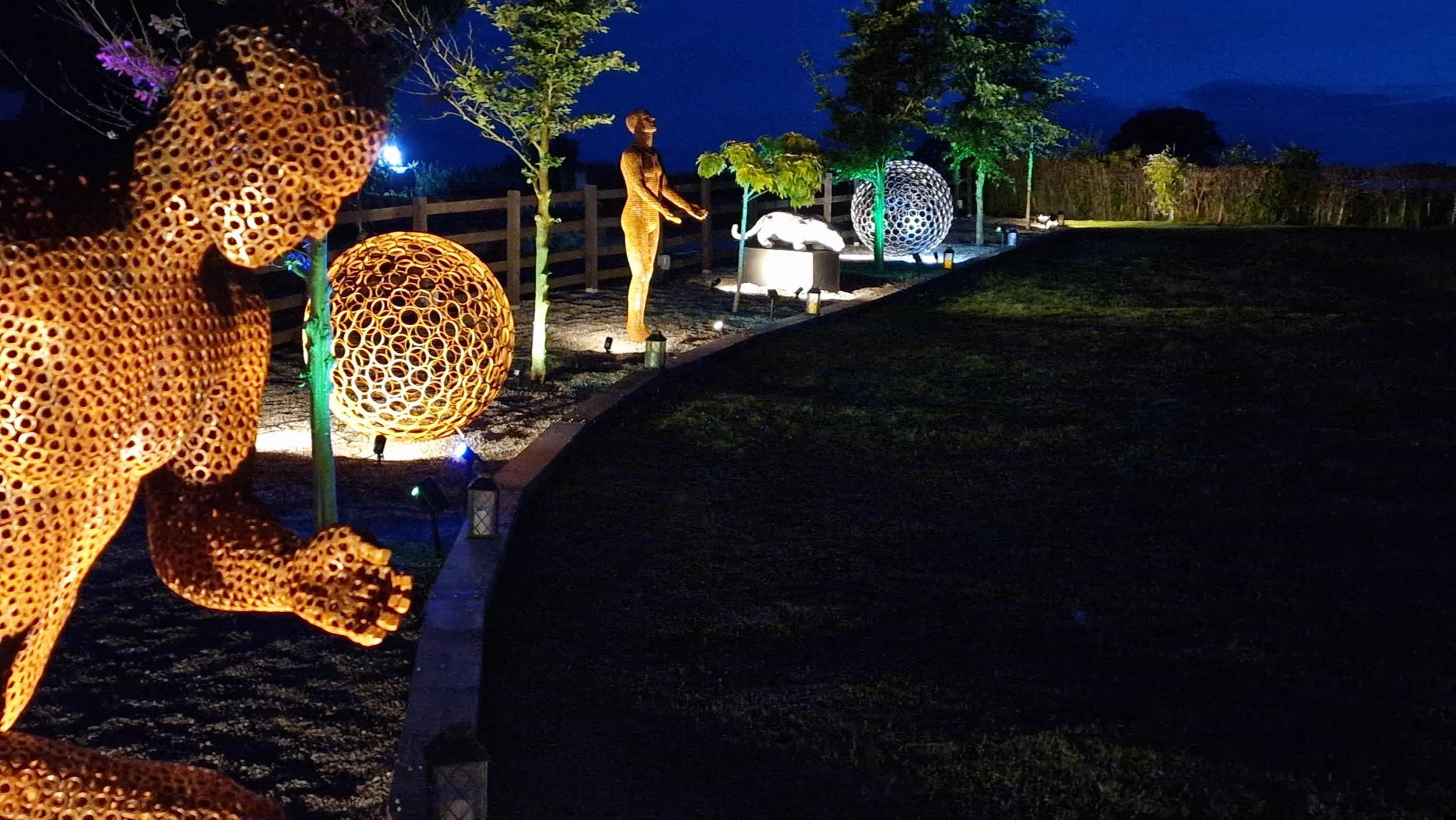 This sculpture is a sphere. Crafted by cutting steel pipes into slices and welding them together from the inside.  Note: The sphere will eventually rust over time.