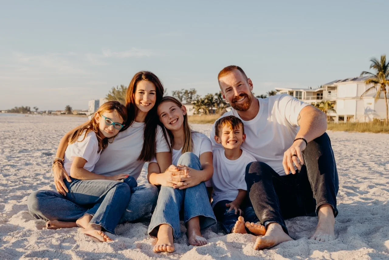 Spencer Hodges with his family on a Florida beach