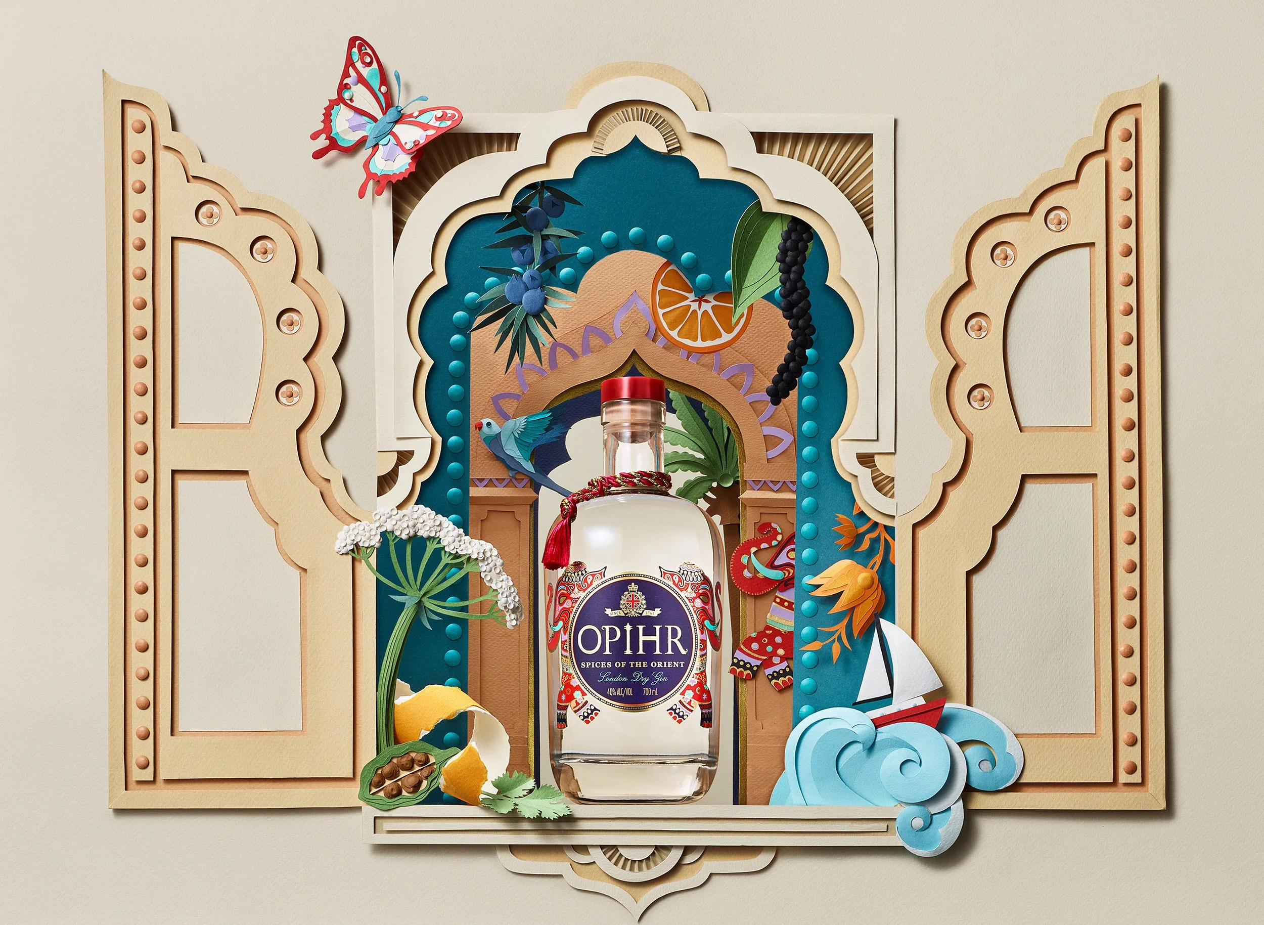 Still Life photograph by photographer Paul Zak for an Ophir Gin advertising campaign, image of their bottle in a stunning paper art set.