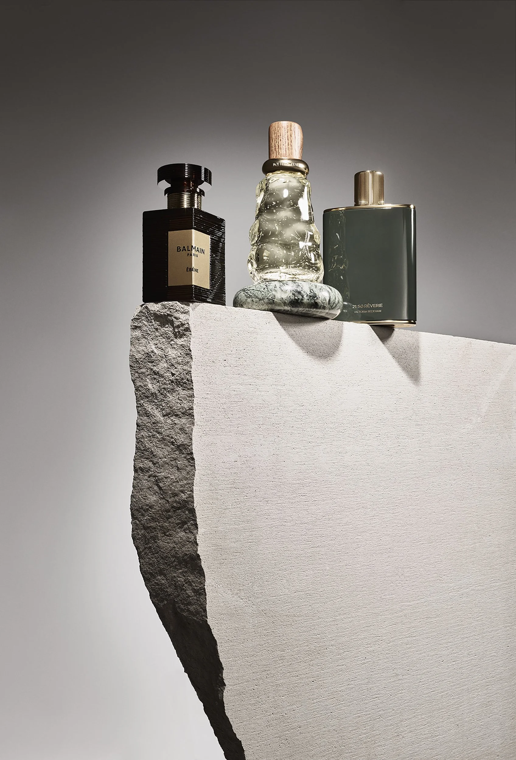 Still Life photograph by photographer Paul Zak of Men's designer fragrances on a rock for Telegraph Luxury Magazine