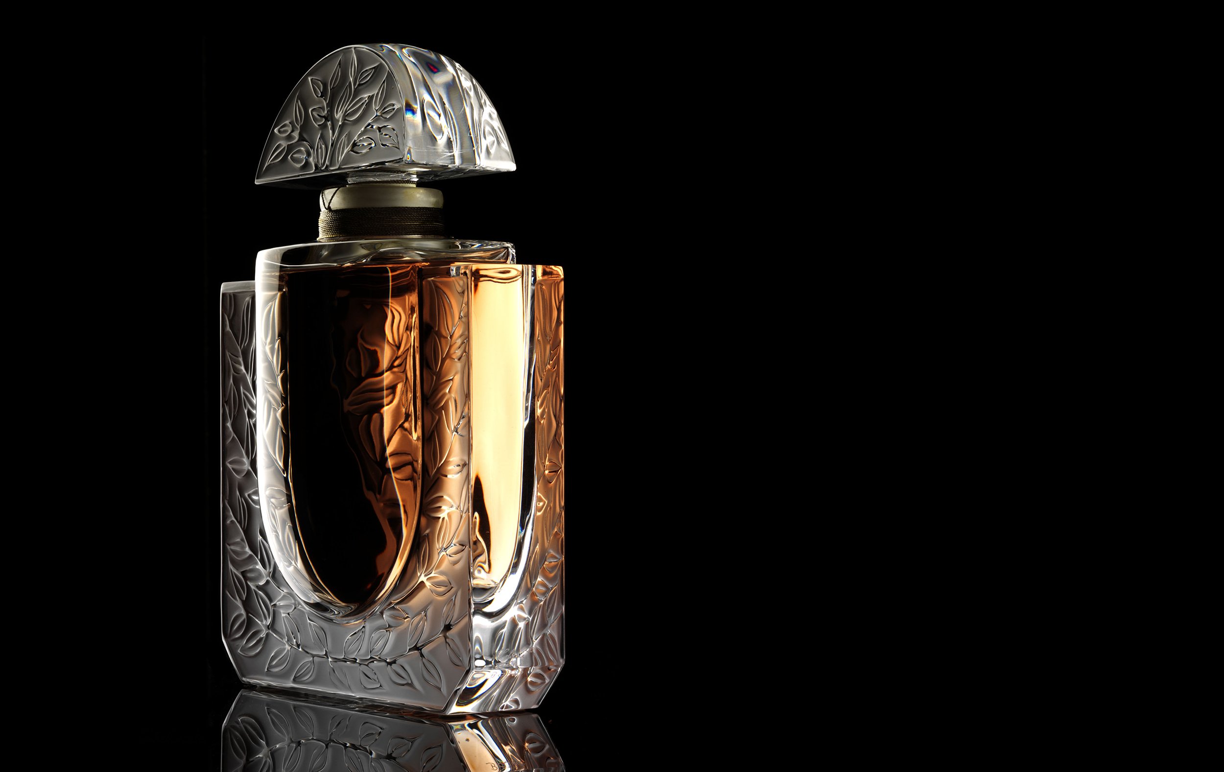 Still Life photograph by photographer Paul Zak of an antique, designer glass perfume bottle.