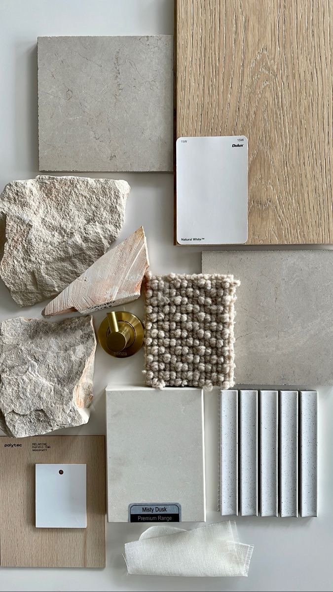 A collection of various interior design materials including paint color samples, tiles, stone, fabric sample, wood finishes, and paint swatch.