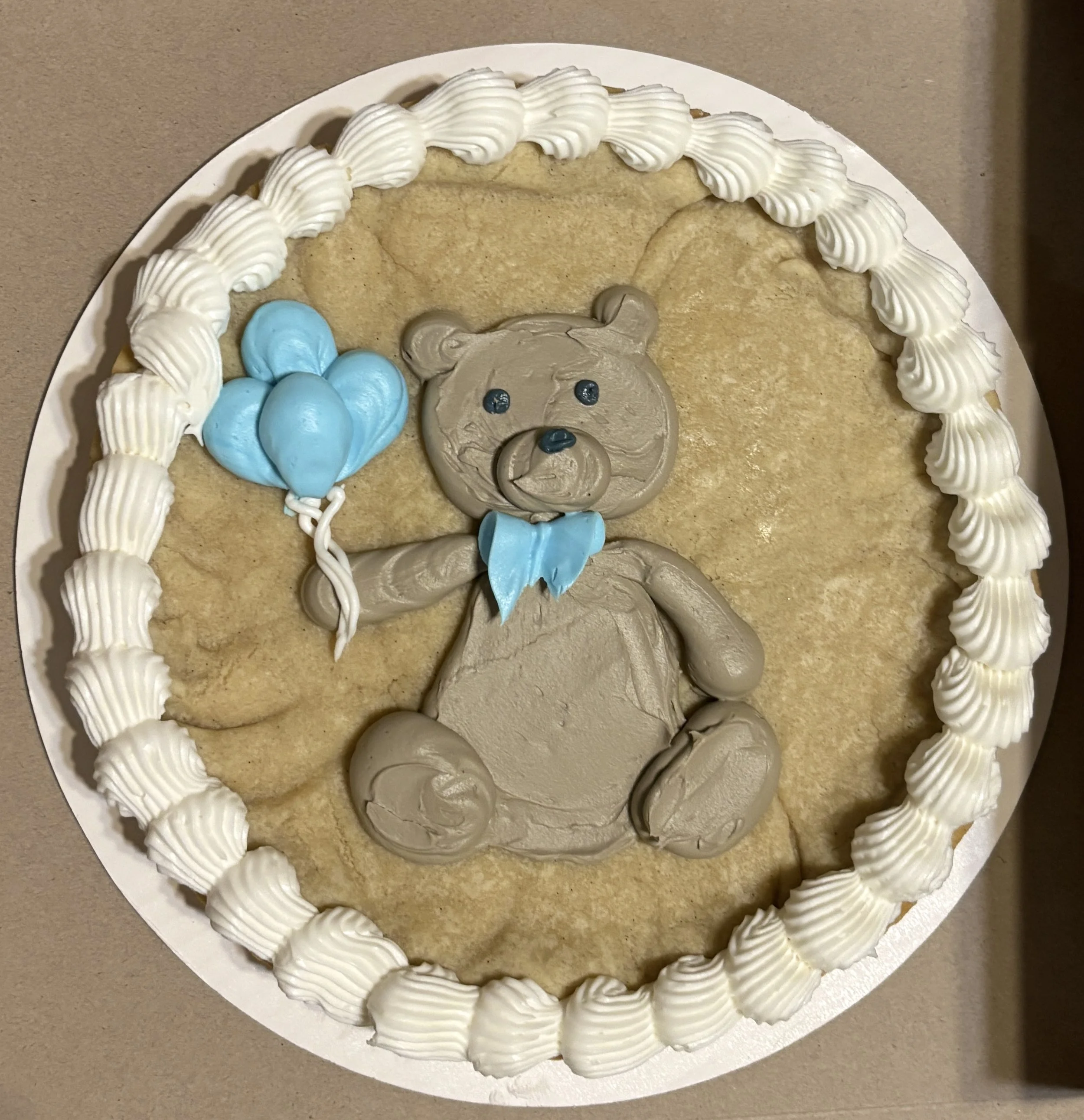 Custom cookie cake to match the custom baby shower Cakepops 