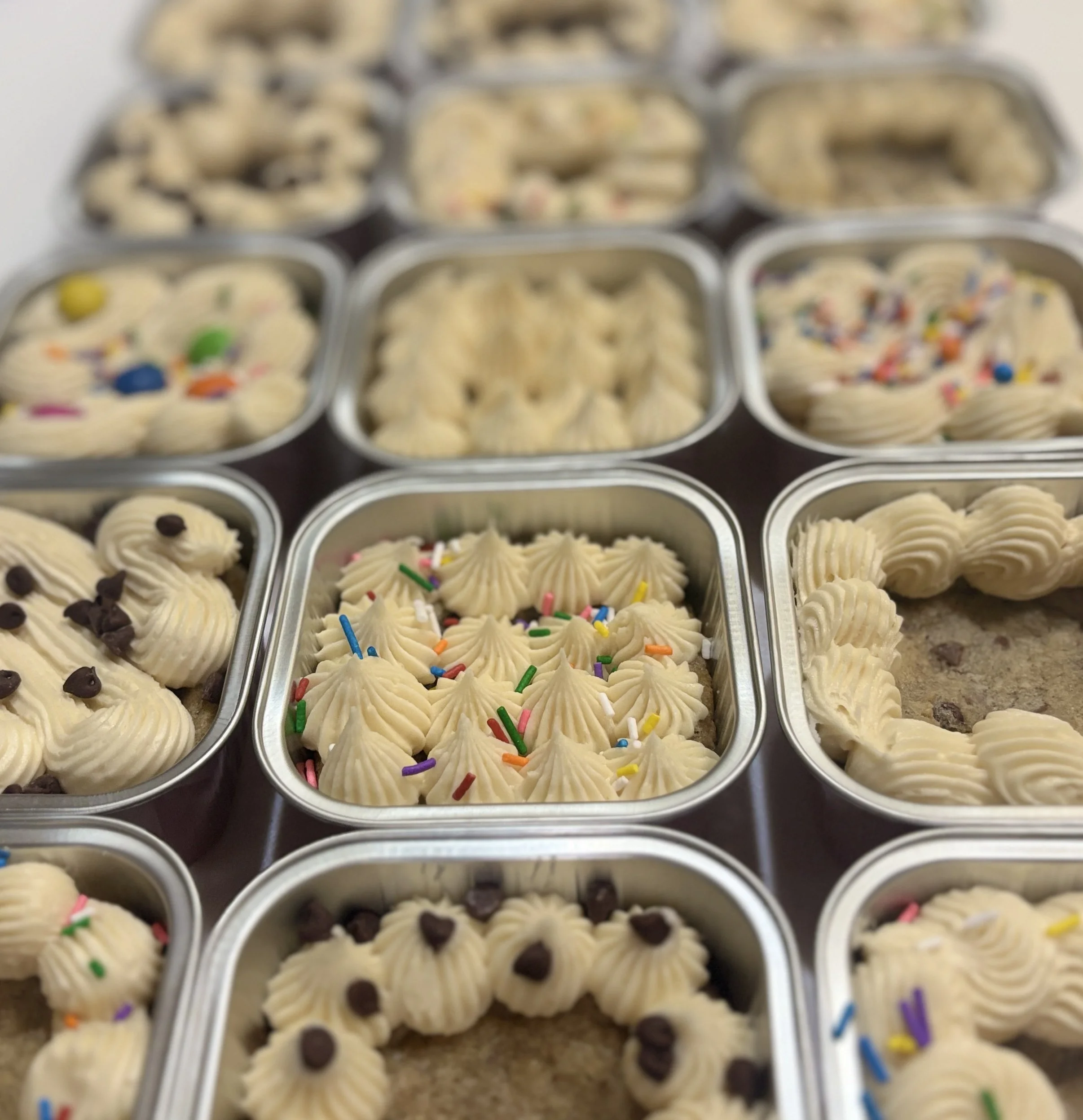 Our delicious chocolate chip cookie cake topped with delicious buttercream frosting