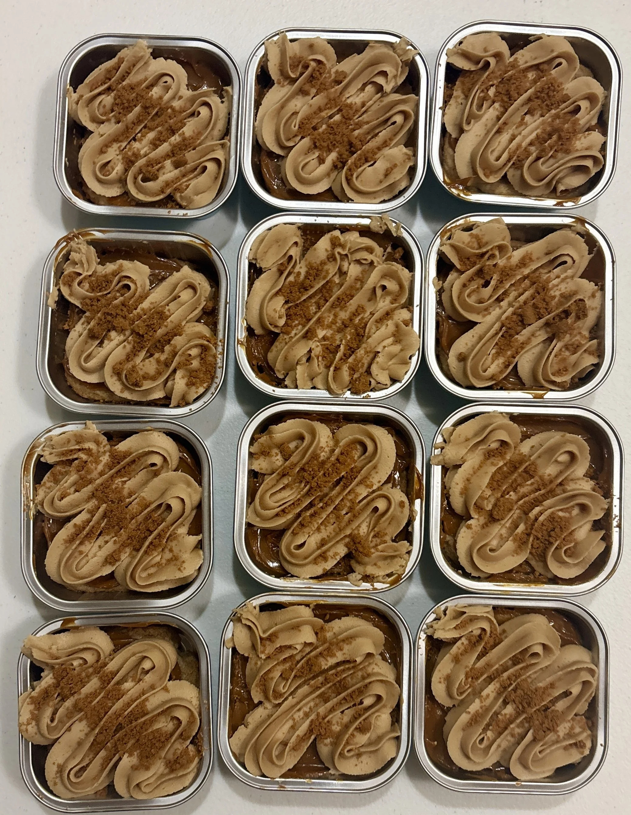Caramel Biscoff cookie cake. Our Biscoff cookie topped with caramel, cookie butter frosting and Biscoff cookie crumbles on top. 