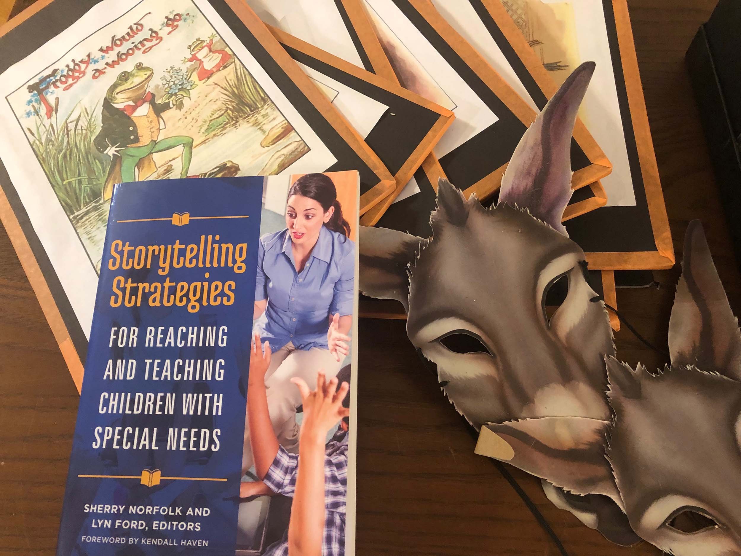 Book Storytelling Strategies for Reaching and Teaching Children with Special Needs displayed with illustrated artwork and donkey masks.