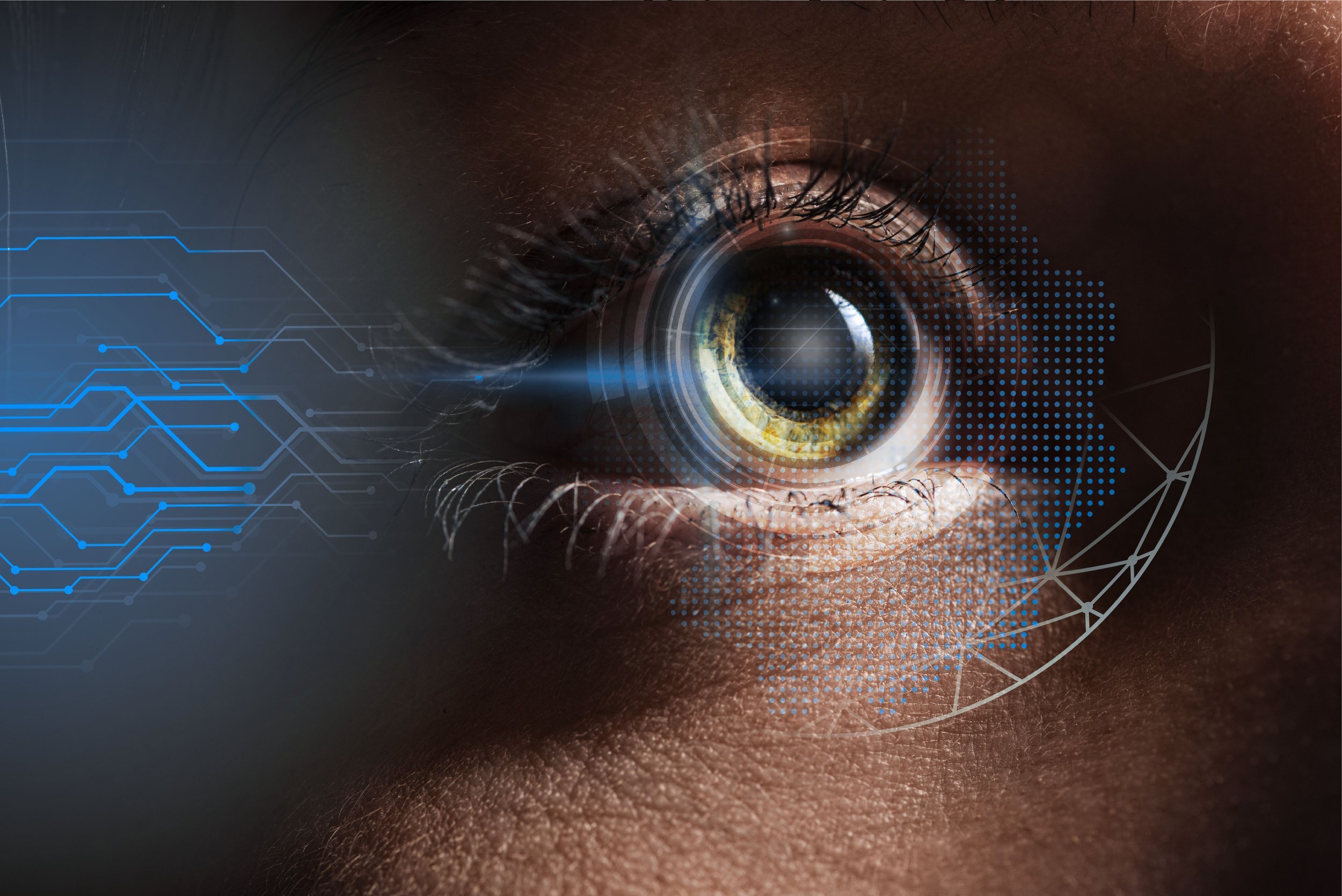 Close-up of a human eye with digital graphics overlay, including circuit-like lines and blue dots, suggesting a technological or futuristic theme.
