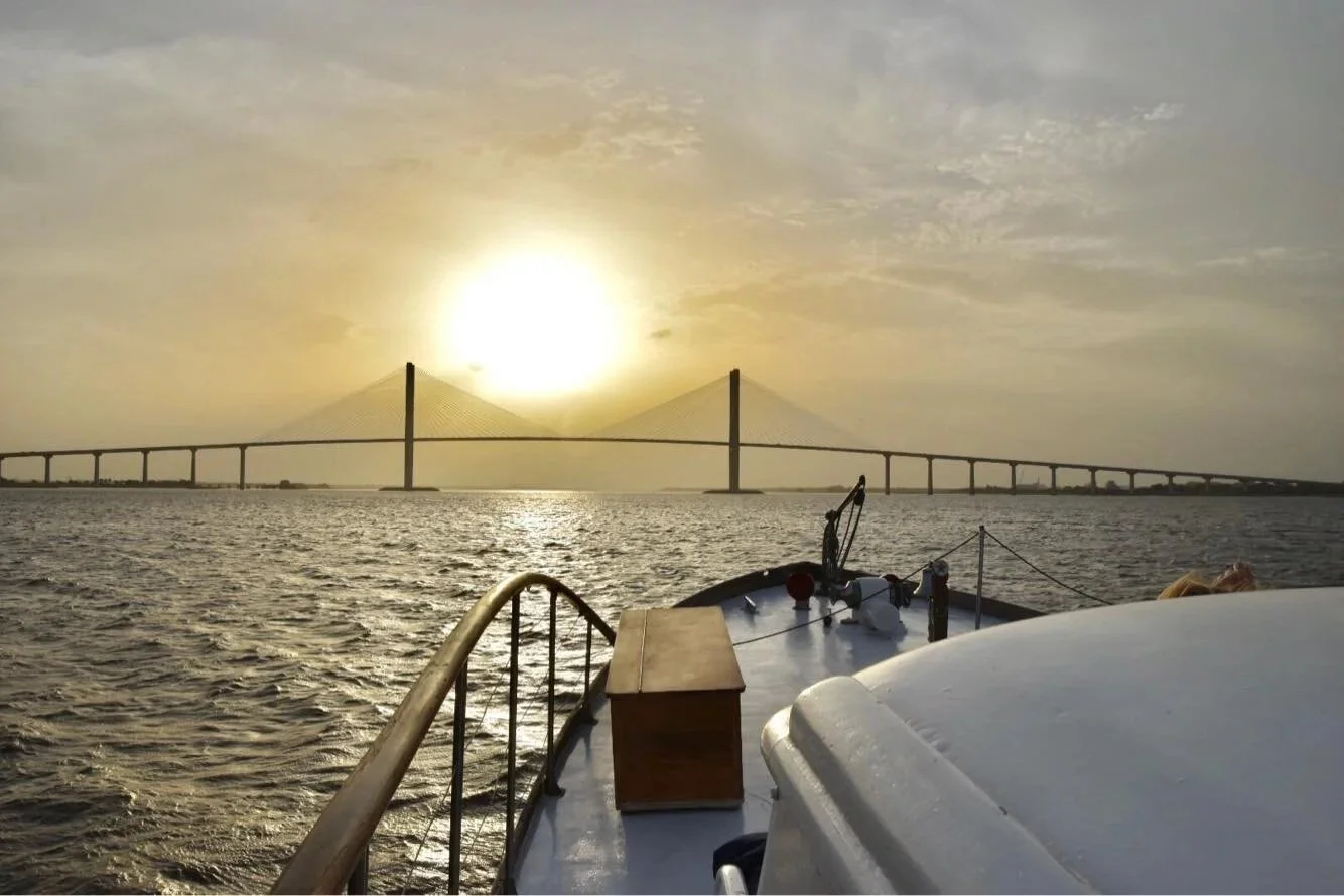 Sidney Lanier Bridge at sunset seen from the bow of the String of Pearls