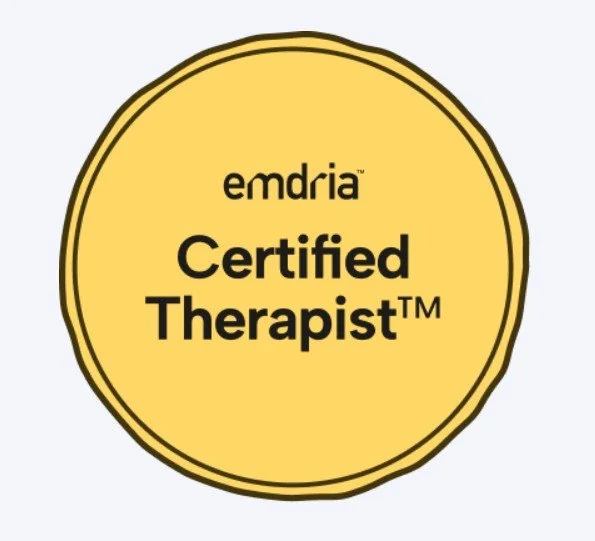 Yellow badge with black outline that reads 'Emdria Certified Therapist'.
