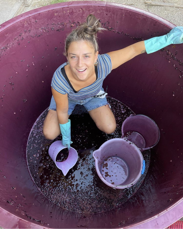 Natural winemaker harvesting and stomping grapes by hand — Cork's commitment to real people behind every bottle