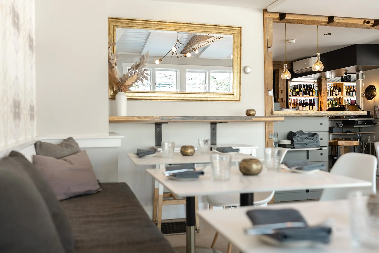 Dining room interior at Cork Restaurant on School Street in Stowe, Vermont — warm, inviting seasonal dining
