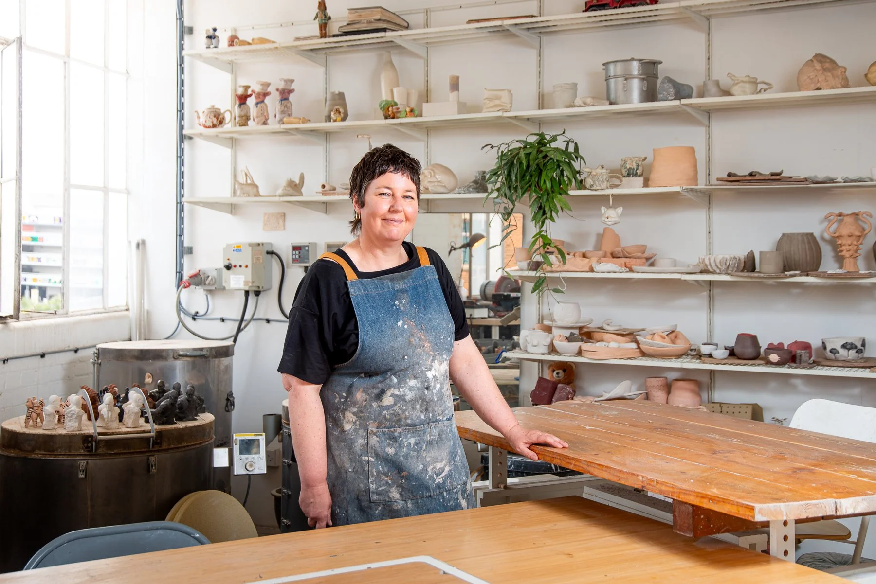Martha in her ceramics studio in Wood Green London