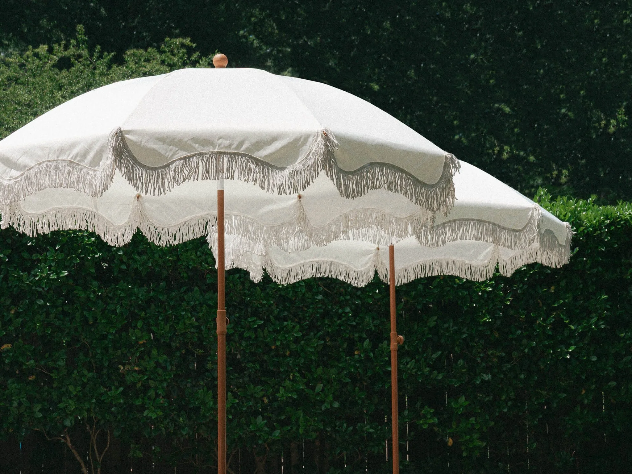 White Fringe Umbrella - lower angled - VERY COMPRESSED - for squarespace website.jpg