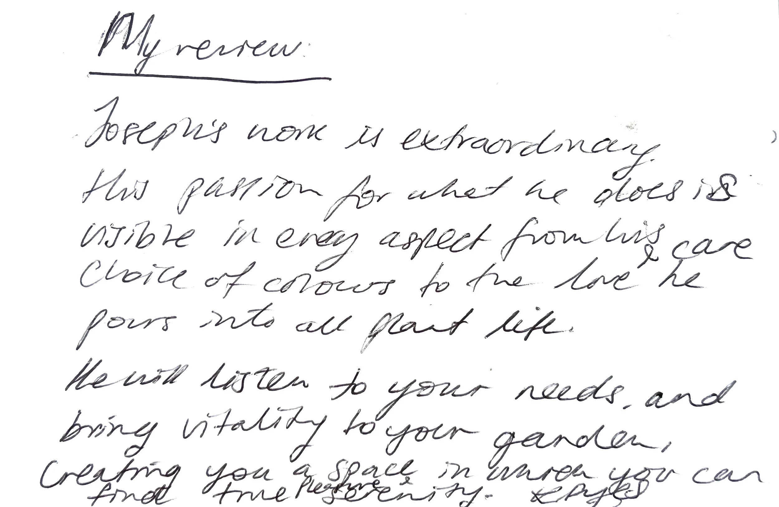 A handwritten review in black ink on white paper with cursive script, starting with the words "My review", of JP Gardens services.